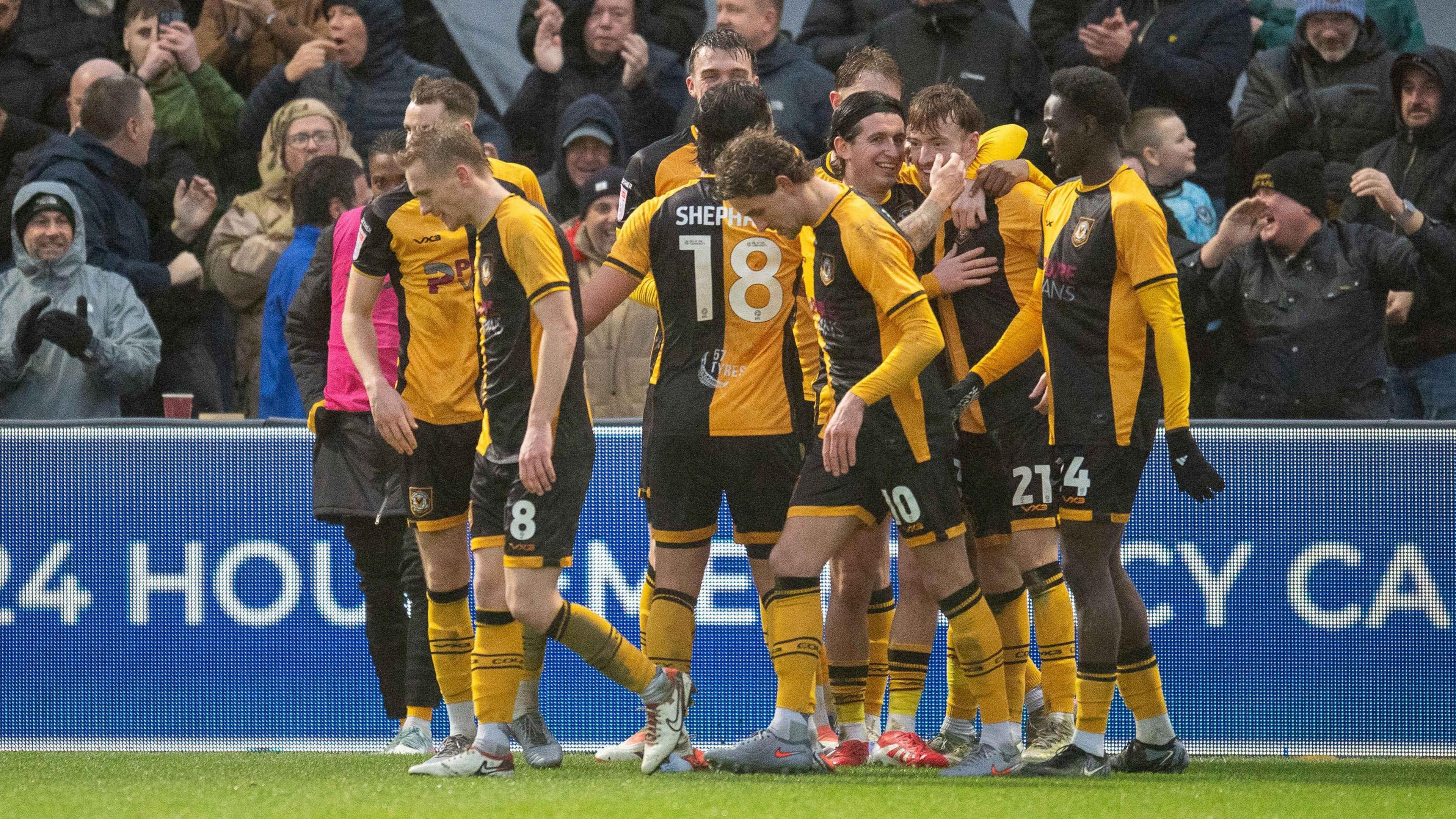 Michael Spellman of Newport County celebrates his goal