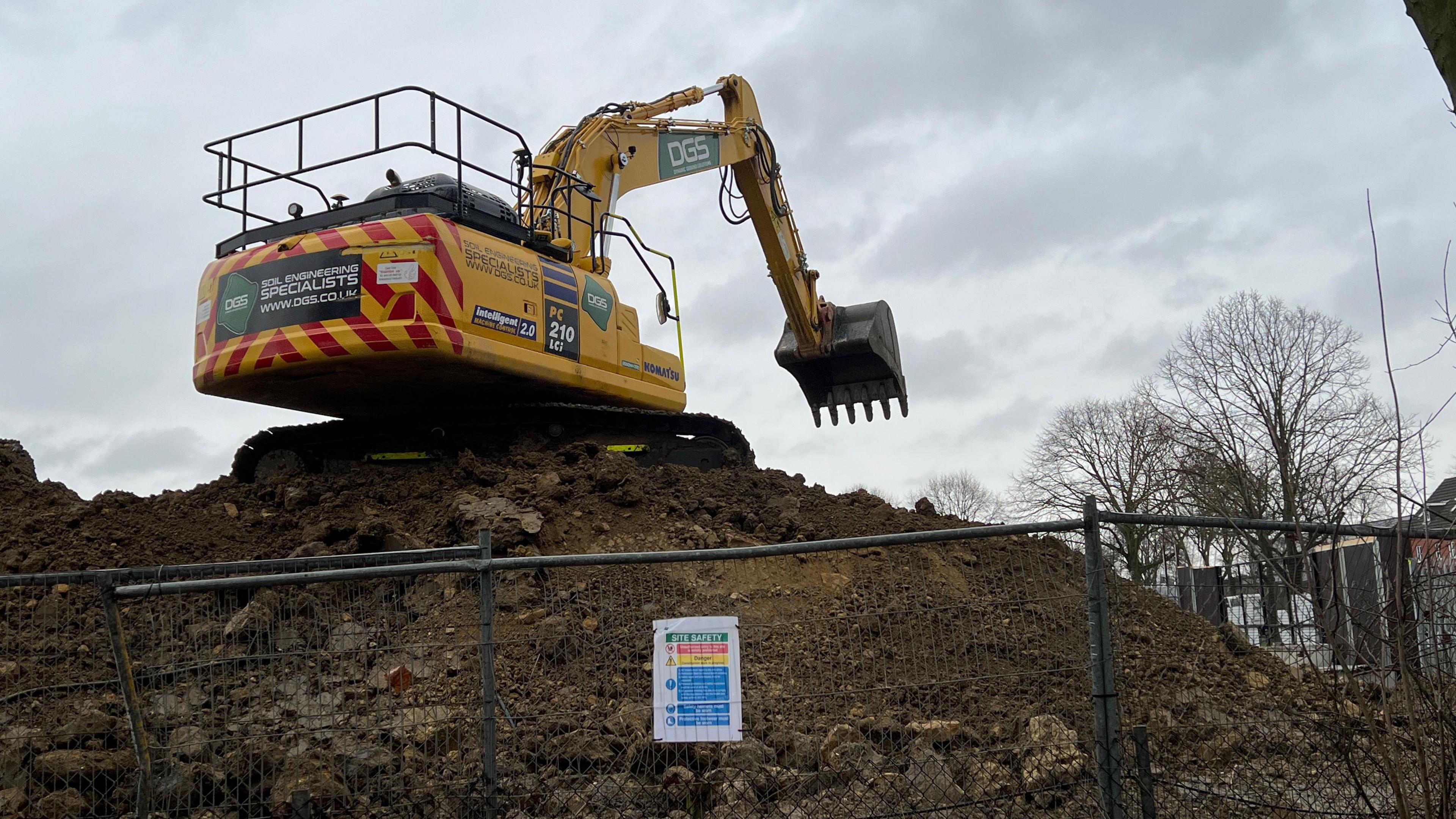 A digger starts construction on Hooke Close in Corby