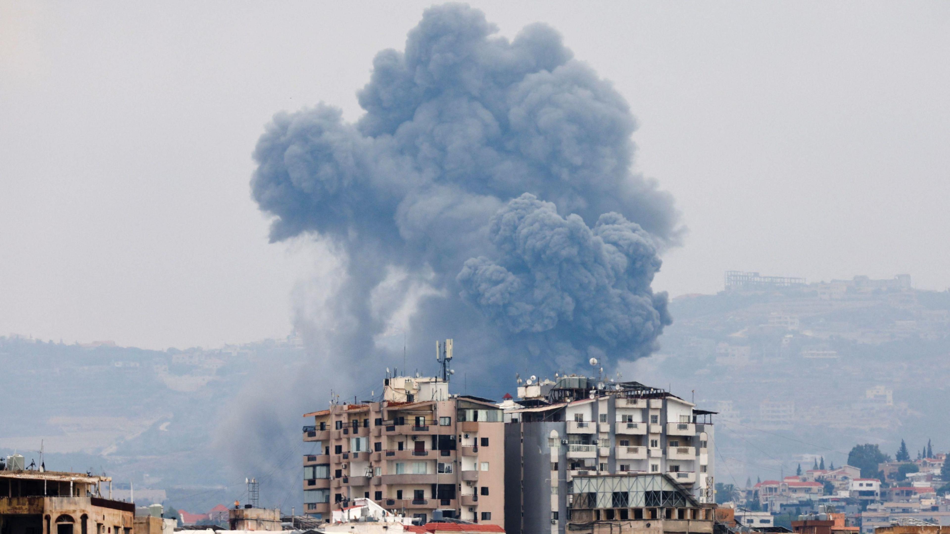 Smoke billows amid the ongoing hostilities between Hezbollah and Israeli forces, as seen from Tyre, southern Lebanon, October 7, 2024.
