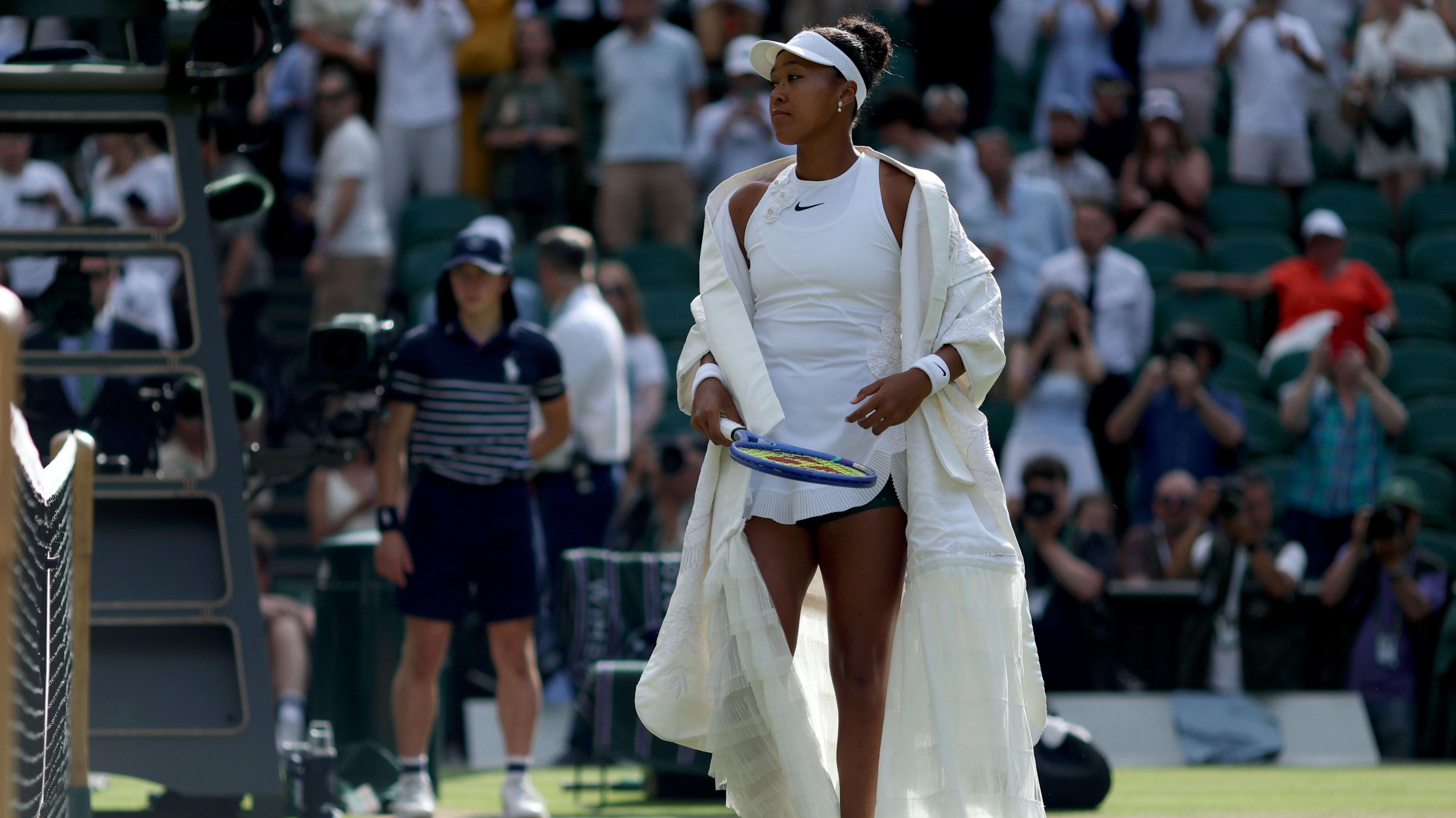 Naomi Osaka warms up for her match against Aryna Sabalenka at Wimbledon
