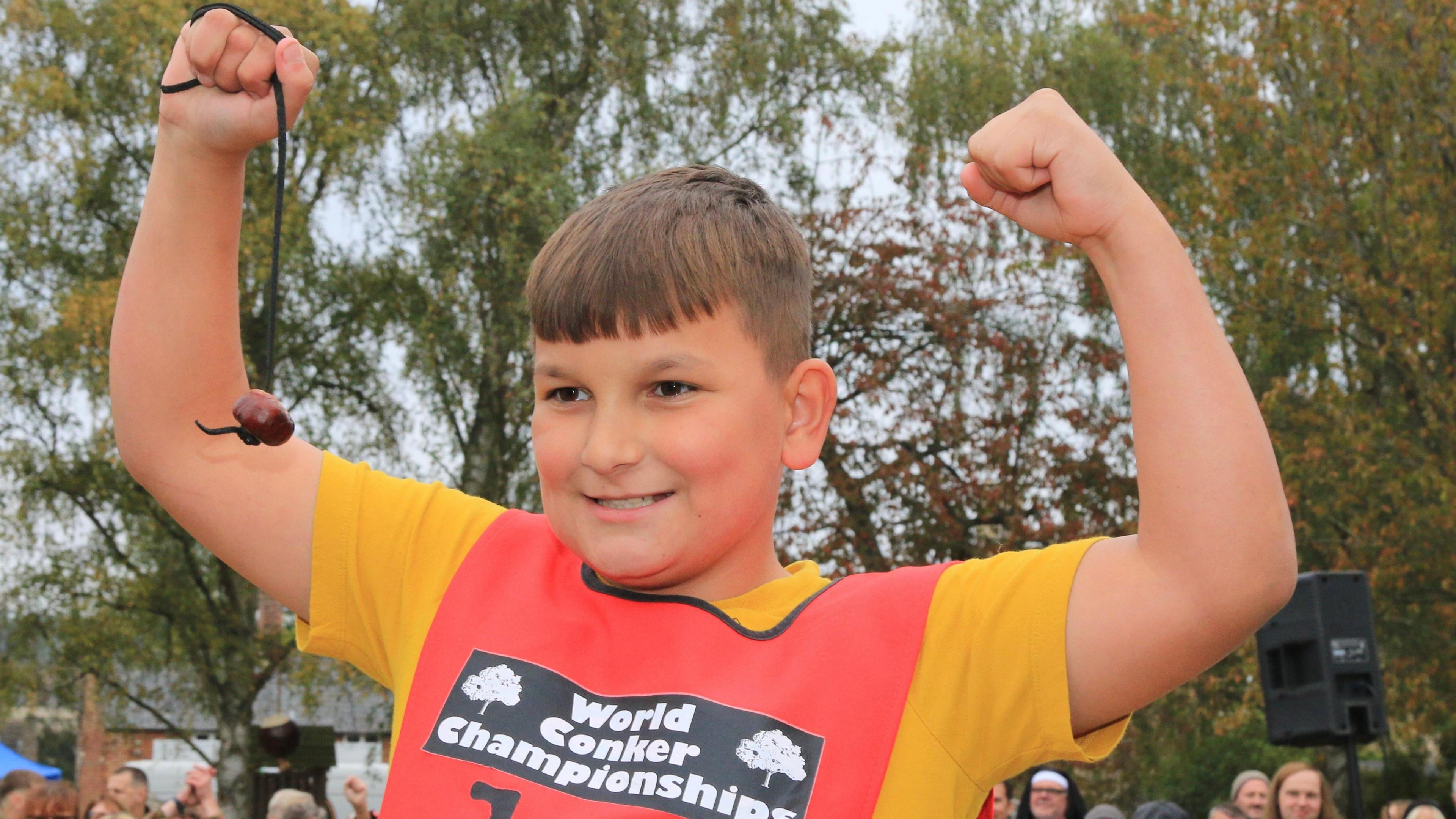 Boy with conker.