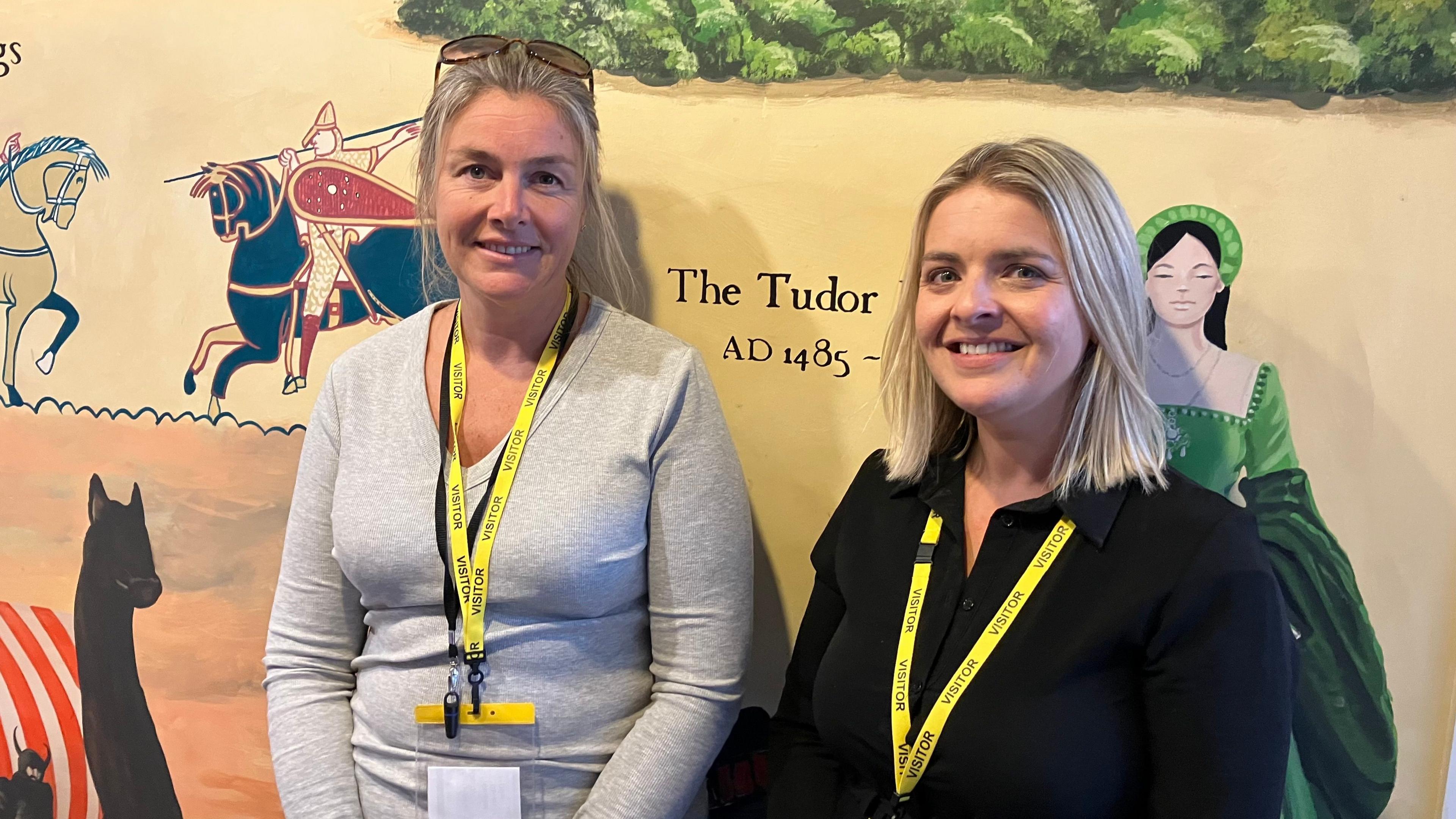 Laura Kenyon and Felicity Morris of the PTA standing in front of the mural