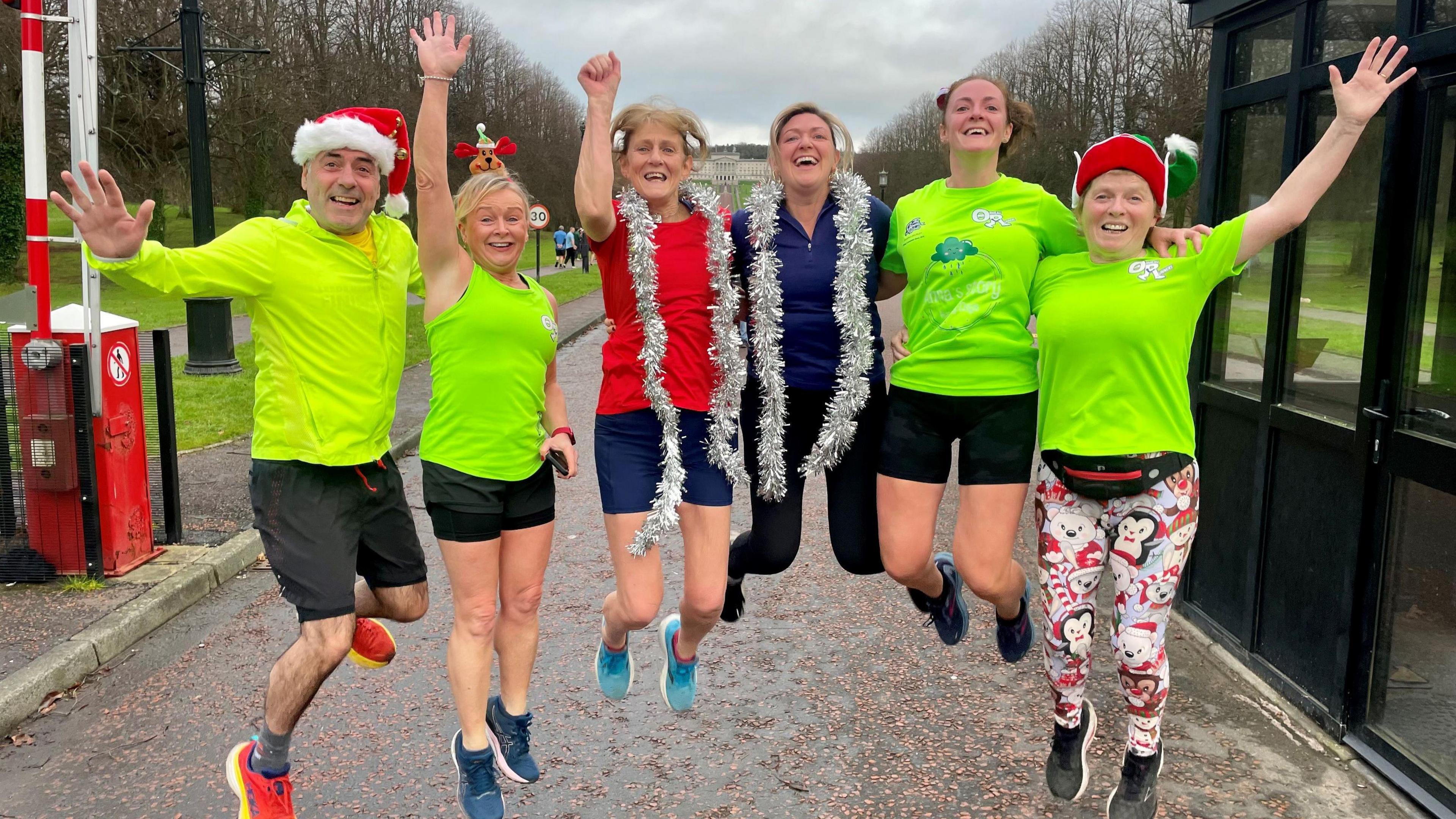 Members of Ormeau Runners running club (left to right) Ciaran O'Hare, Paula Kealey, Deirdre Fitzpatrick, Jude Tweedie, Louise Fitzpatrick and Ruth Jack at the Christmas Day Parkrun on the Stormont Estate in Belfast. 