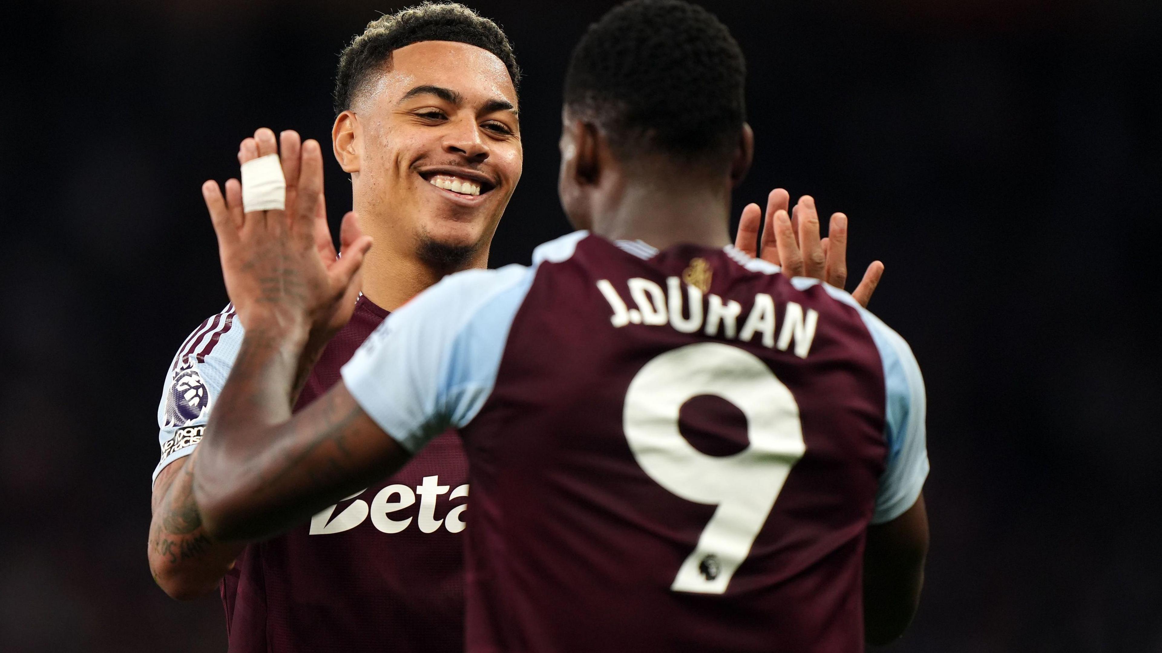 Morgan Rogers celebrates an Aston Villa goal with Jhon Duran