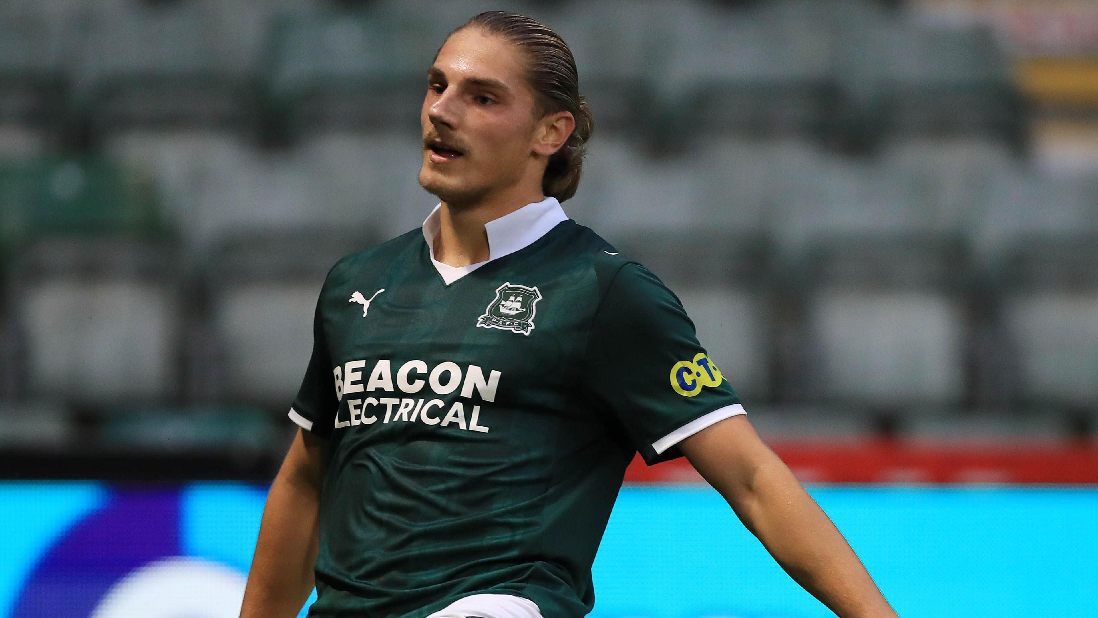 Lorent Tolaj celebrating scoring for Plymouth