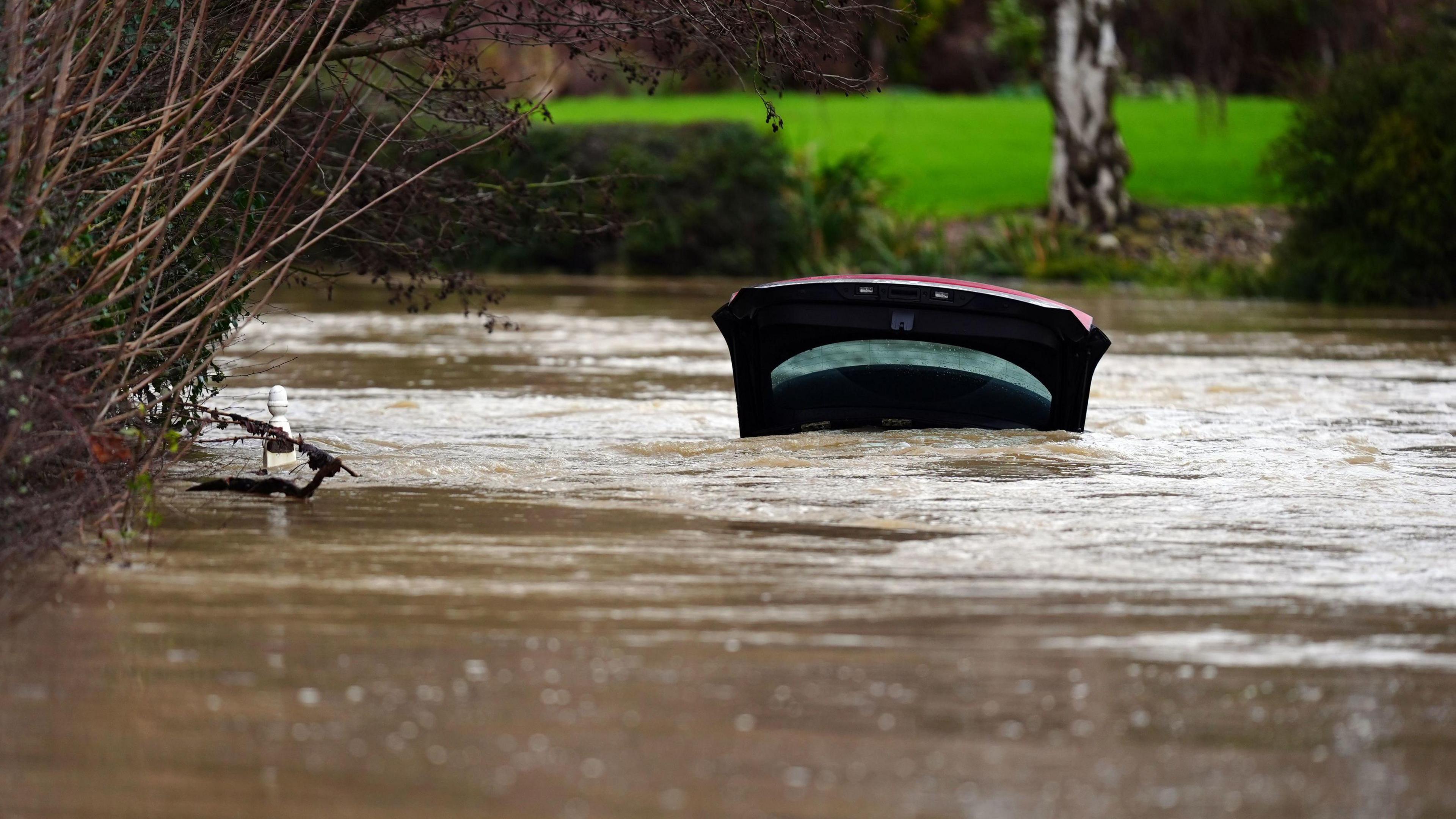 A car submerged in the River Devon in Bottesford