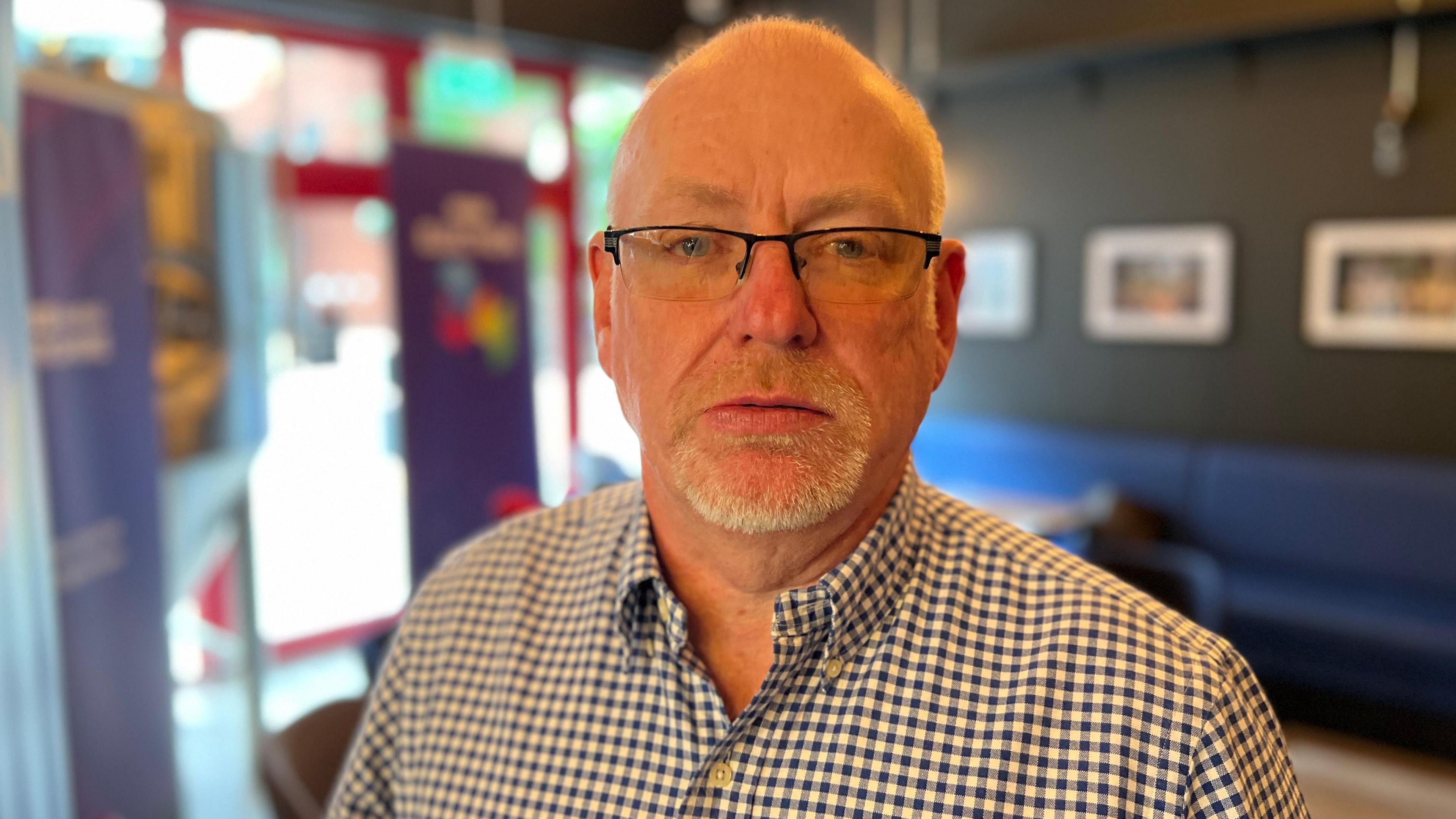 Colin Wright standing in cafe