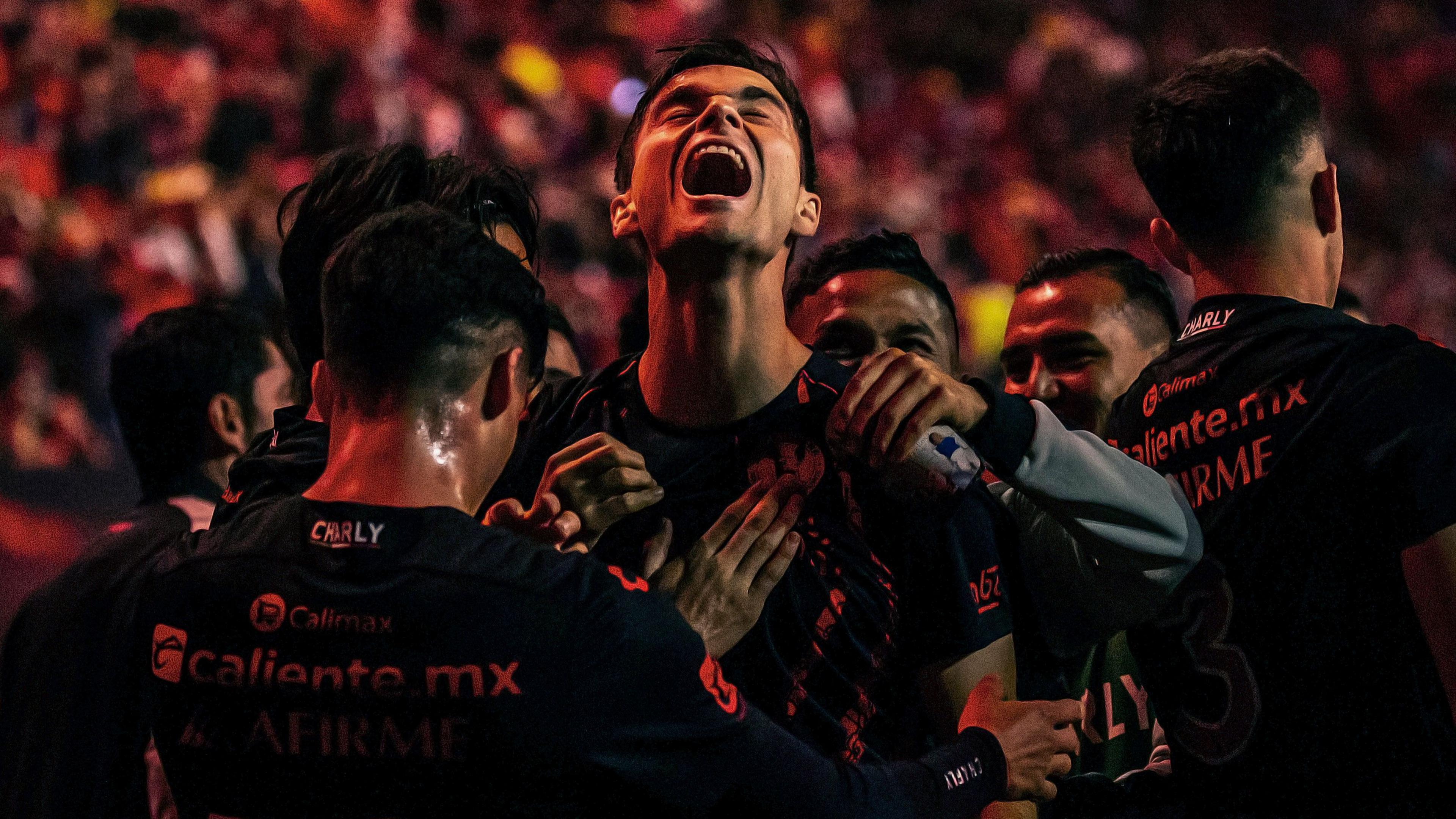 Unai Bilbao of Tijuana celebrates with team-mates after scoring their team's first goal against America in the Torneo Apertura 2024 Liga MX at Caliente Stadium on 21 November in Tijuana, Mexico