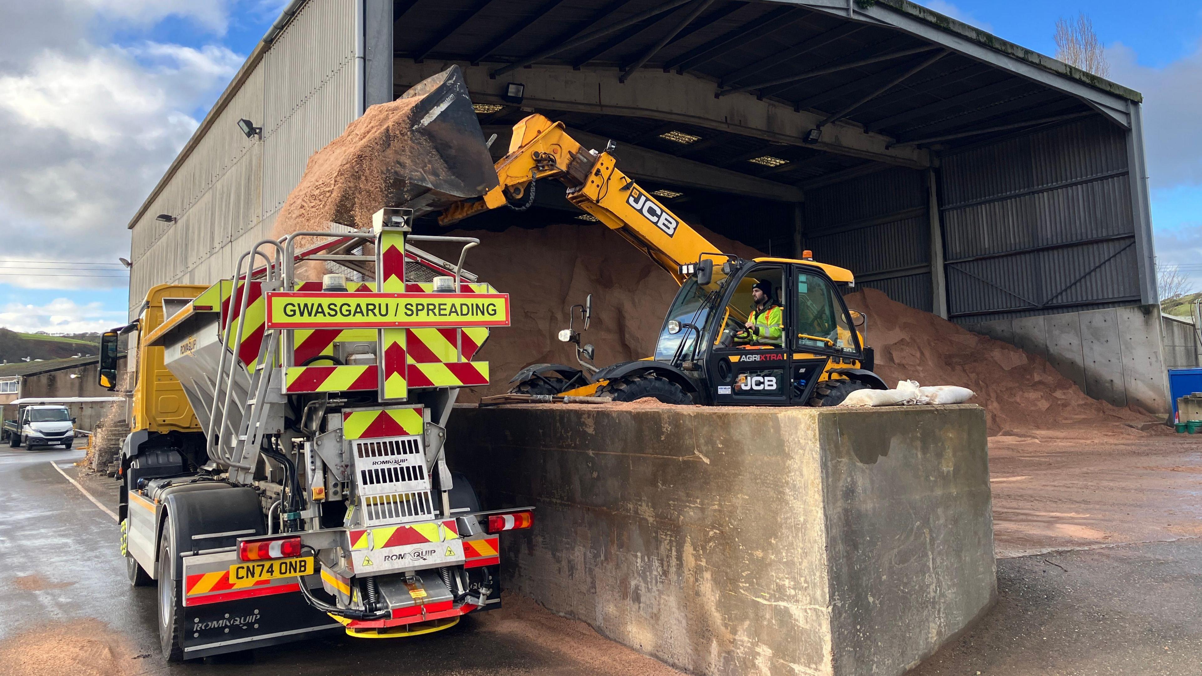 A gritting lorry being filled at Ceredigion council's depot in Aberystwyth.