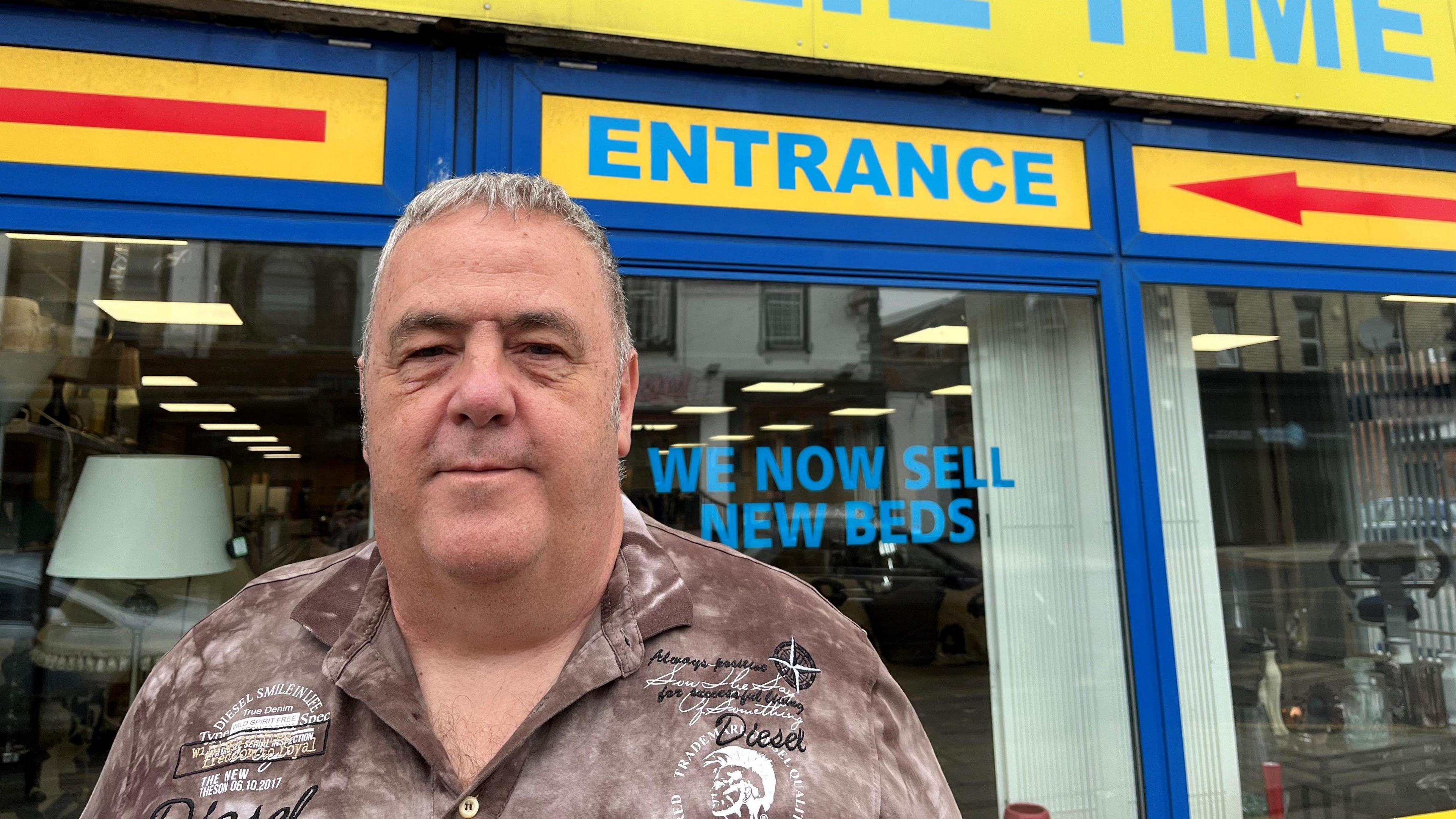 Ian Cawley, manager of Poolie Time Exchange, in front of the charity shop