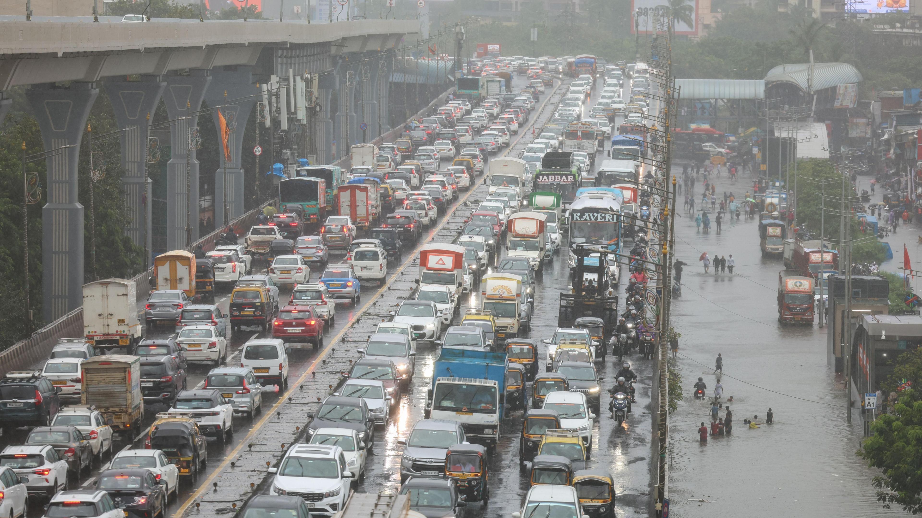 A view of traffic jam on a flooded street during heavy rains in Mumbai.