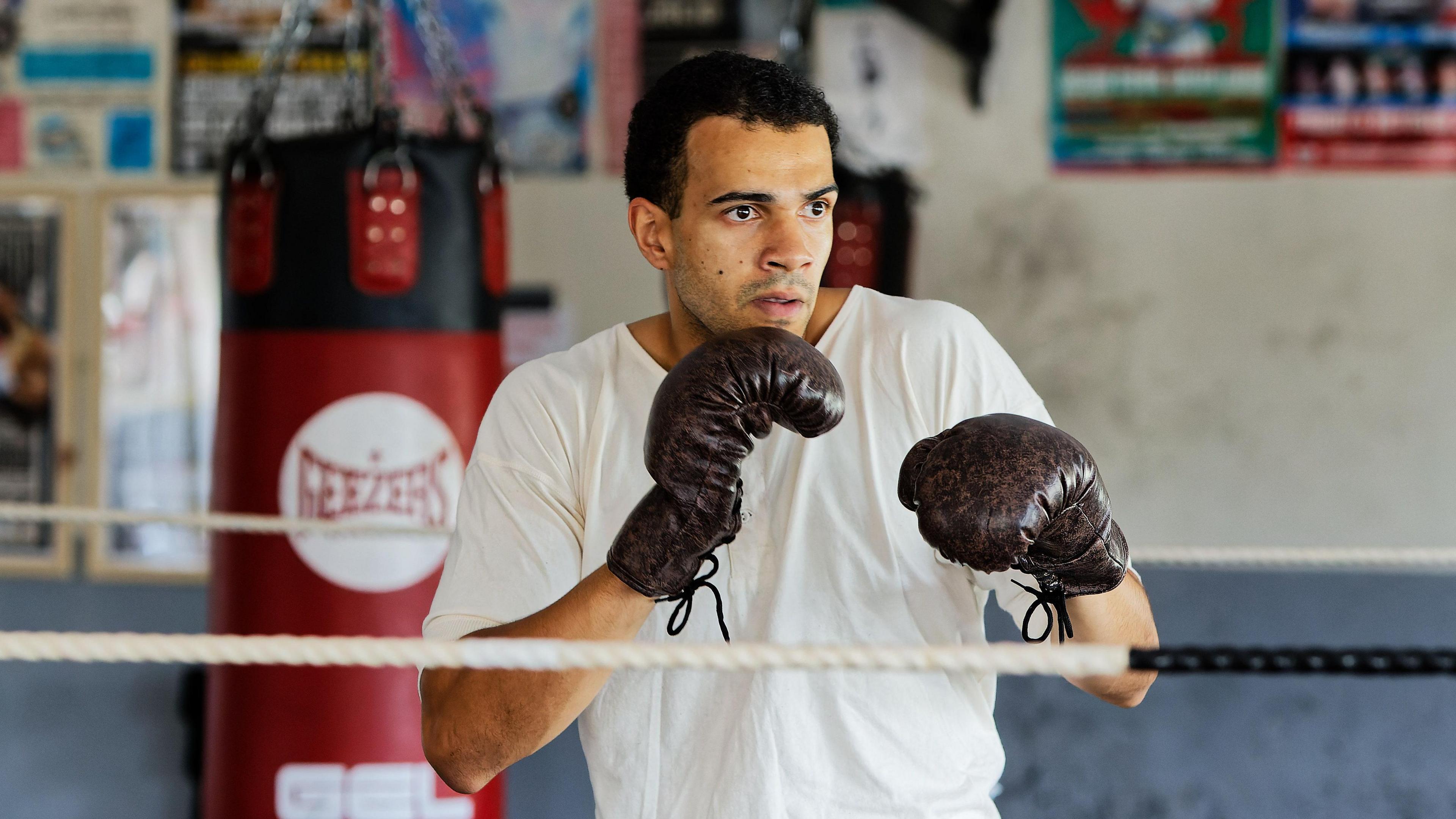 Simeon Desvignes, who plays Cuthbert, shadow boxing in rehearsals