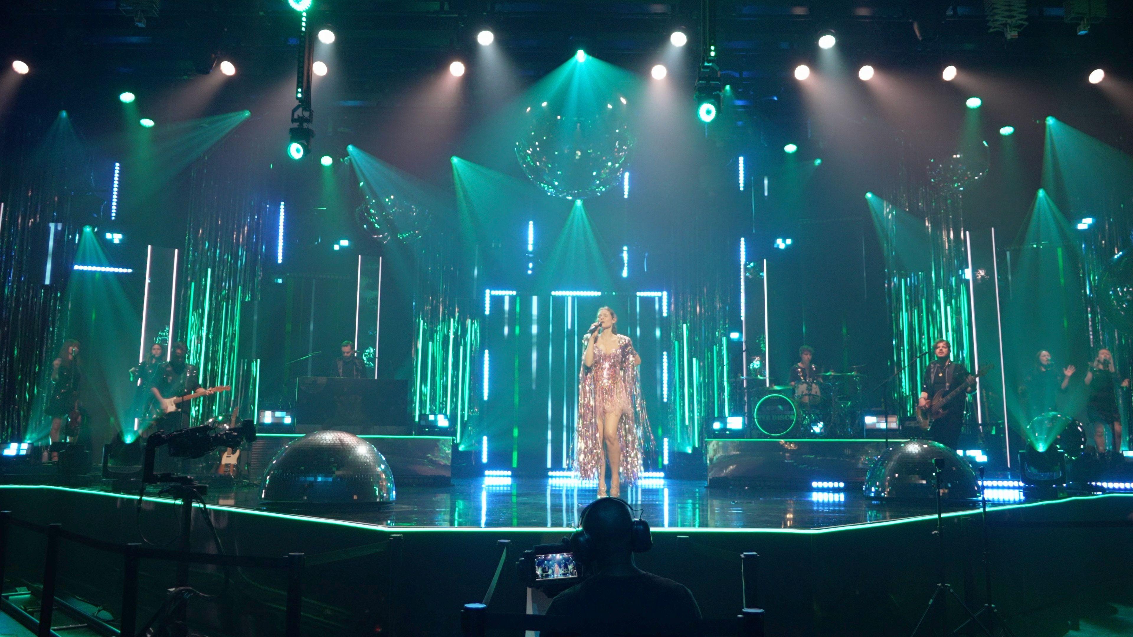 Sophie Ellis-Bextor during rehearsals for her New Year's Eve Disco concent on BBC1. She is singing beneath what is claimed to be the country's biggest disco ball