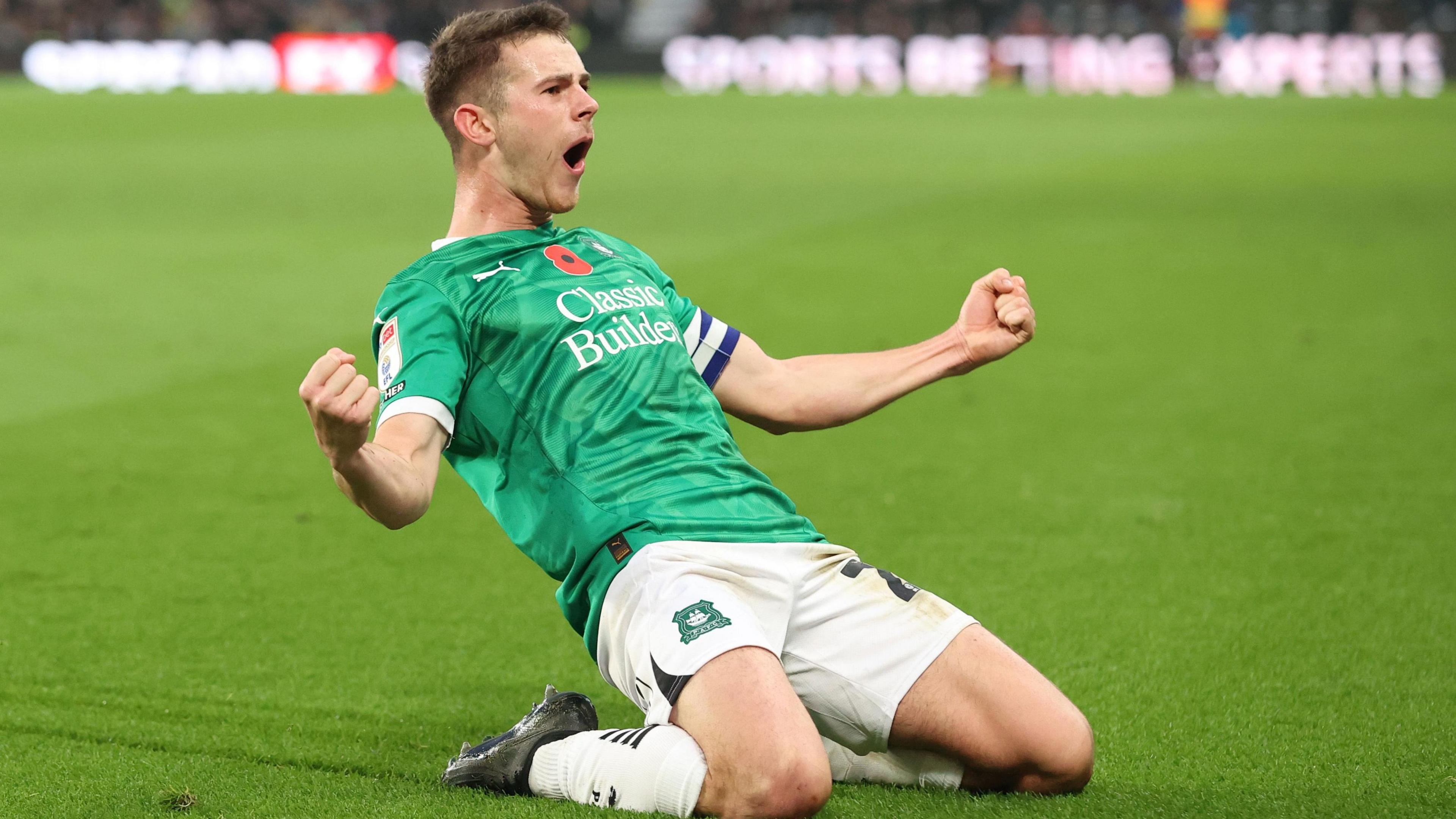 Adam Randell celebrates scoring against Derby County