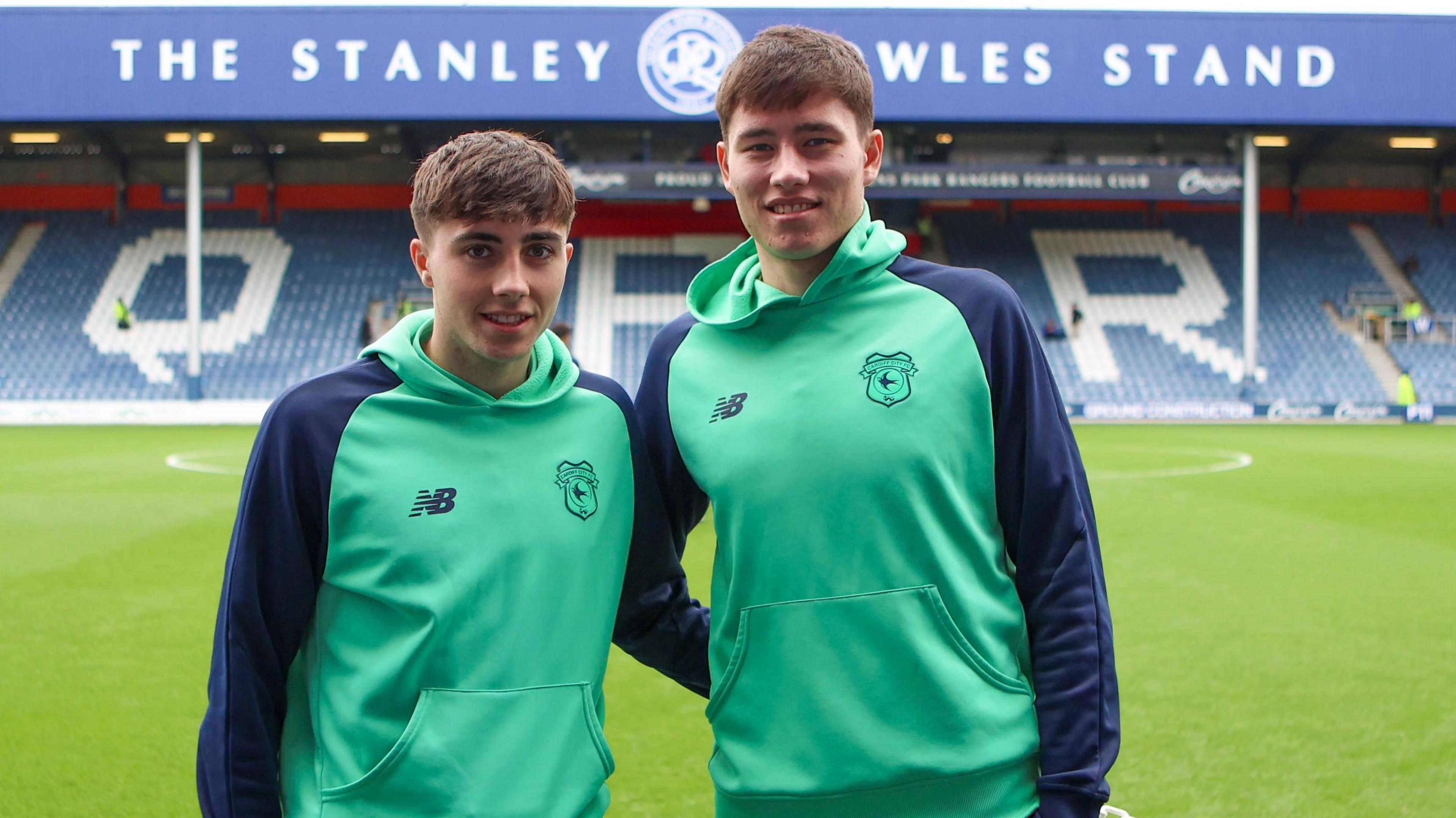 Joel Colwill on the pitch with his brother Ruben before a Cardiff match