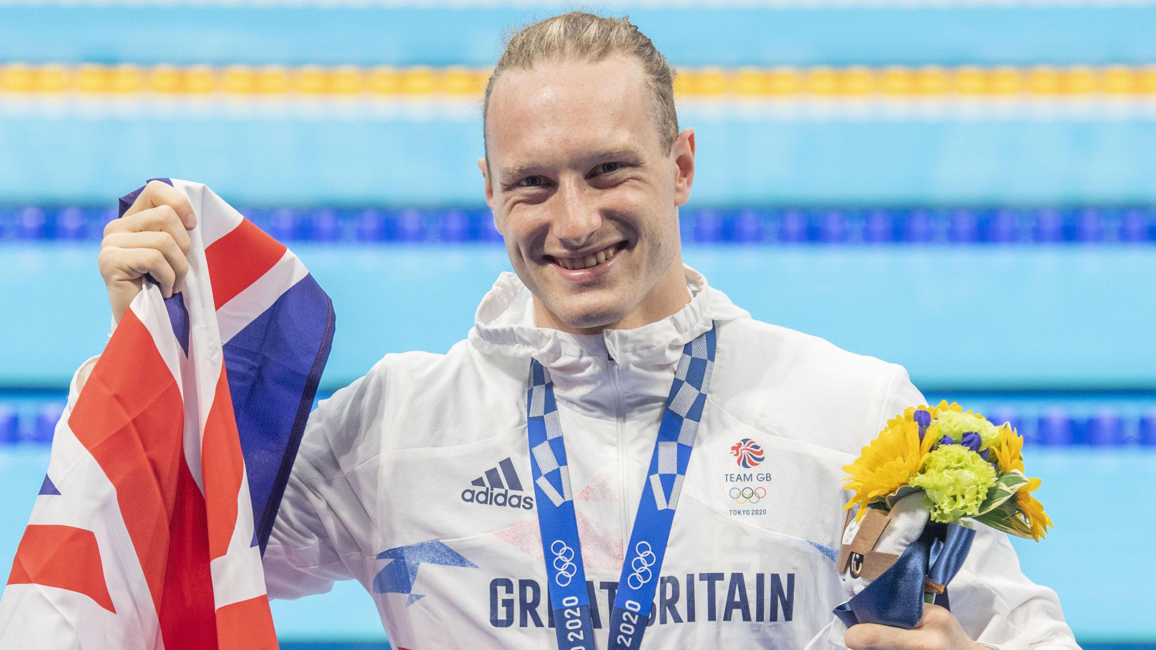 Luke Greenbank with the bronze medal around his neck in Tokyo