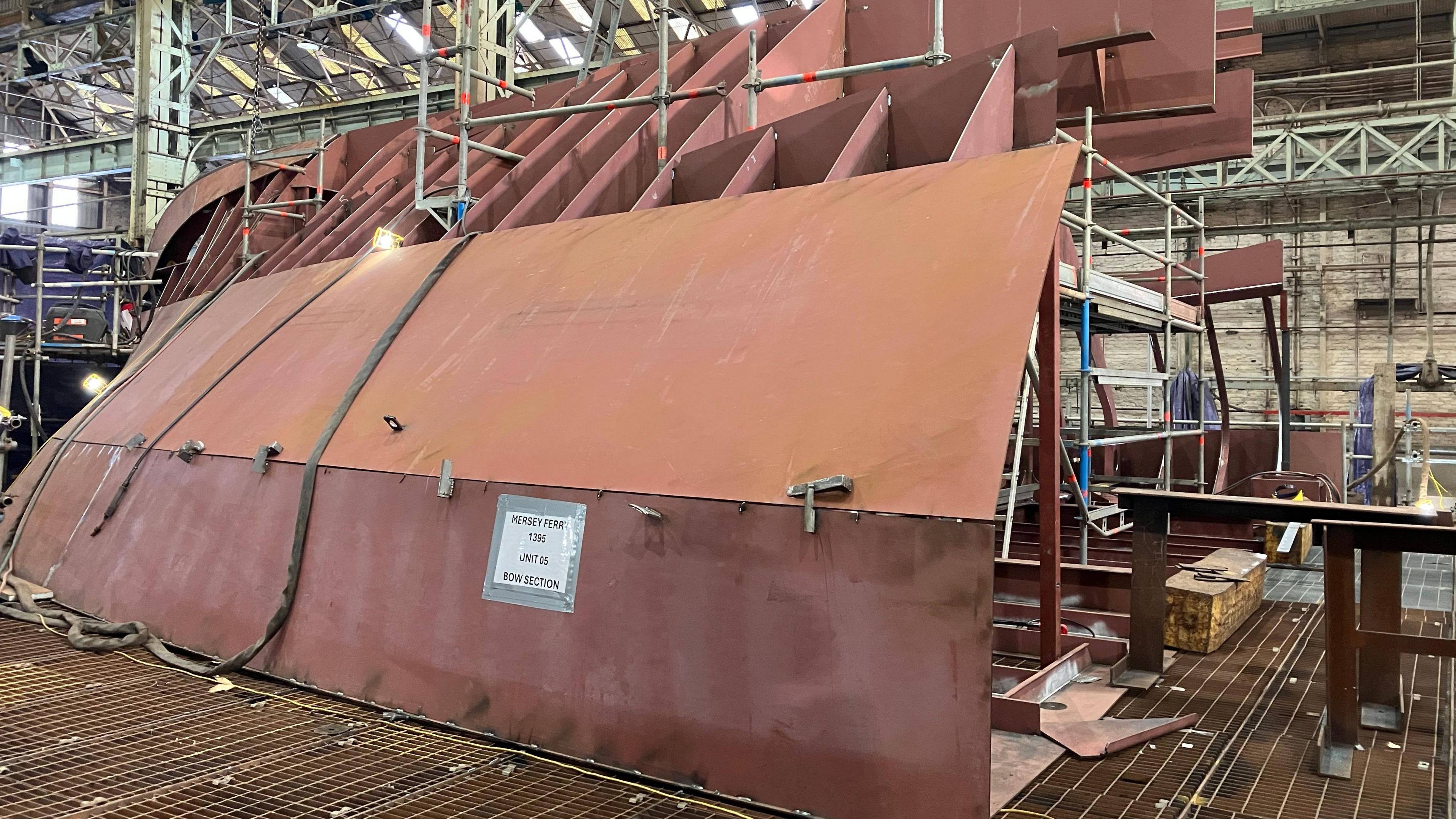 The bow section at the early stage of construction inside Cammell Laird shipbuilders