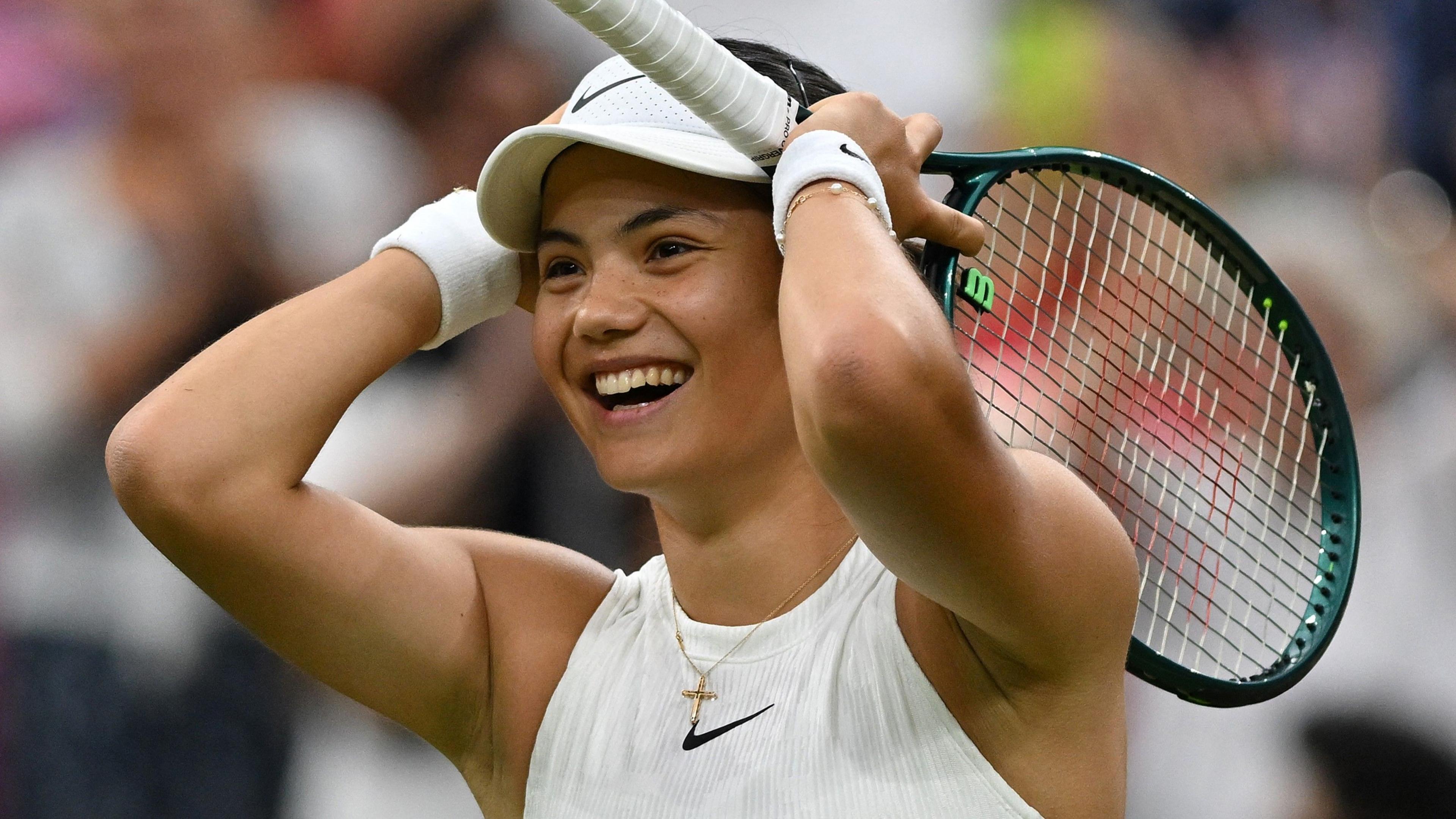 Emma Raducanu celebrates winning a point at Wimbledon in 2024