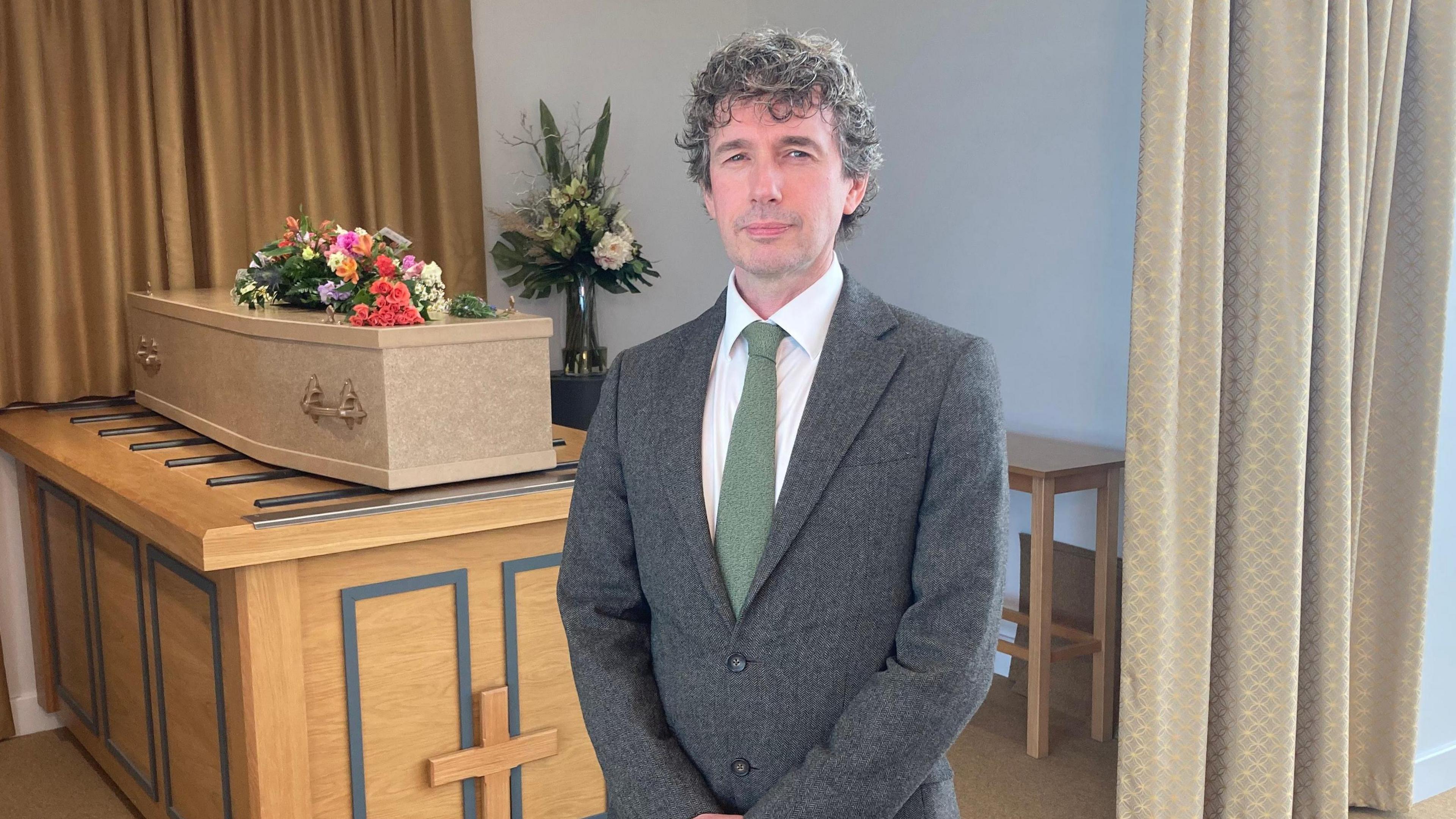 Funeral celebrant Martin Ellis in Wealden Crematorium's ceremony hall