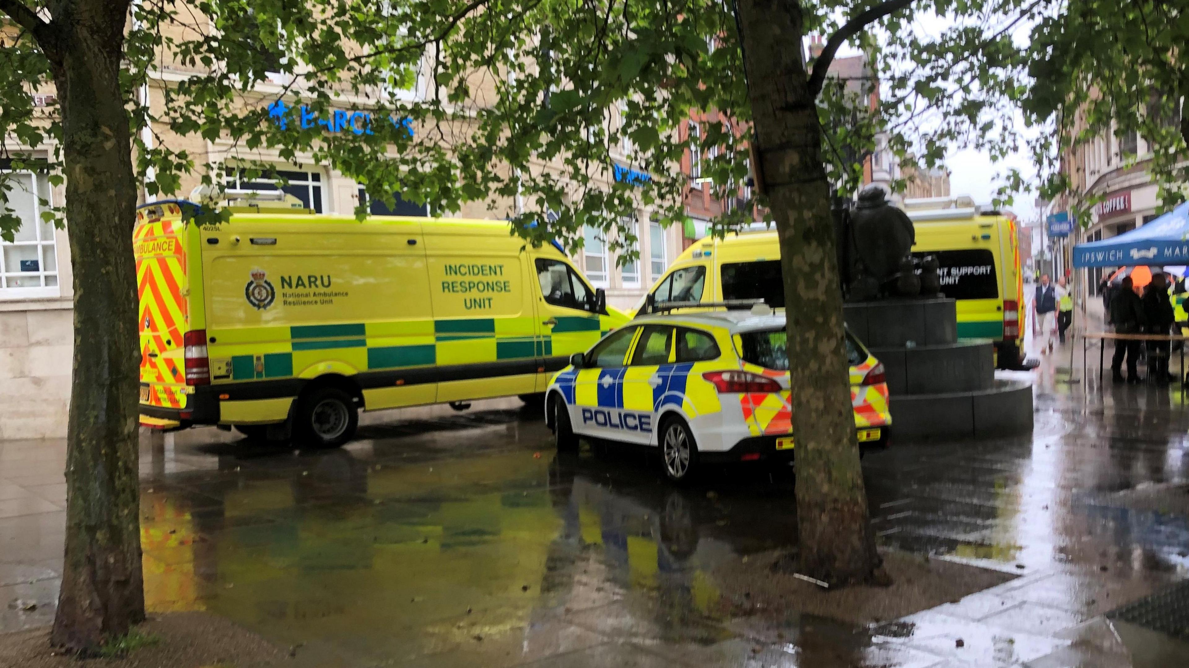 Police officer and emergency vehicles in Ipswich