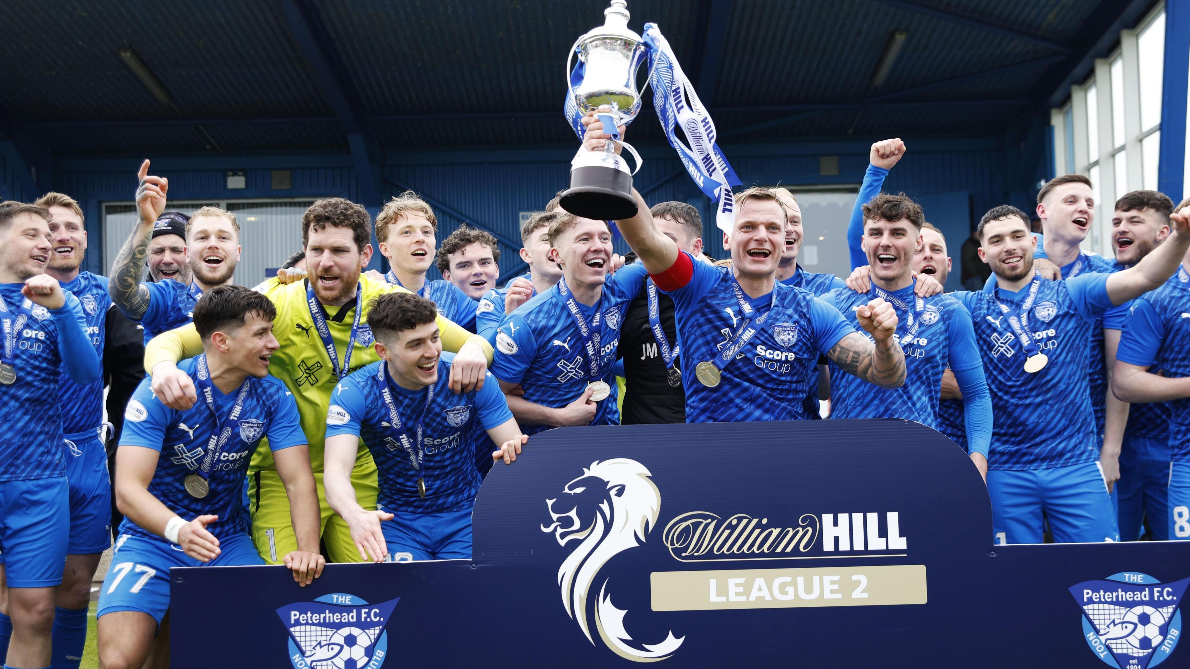 Peterhead celebrate with the League Two trophy