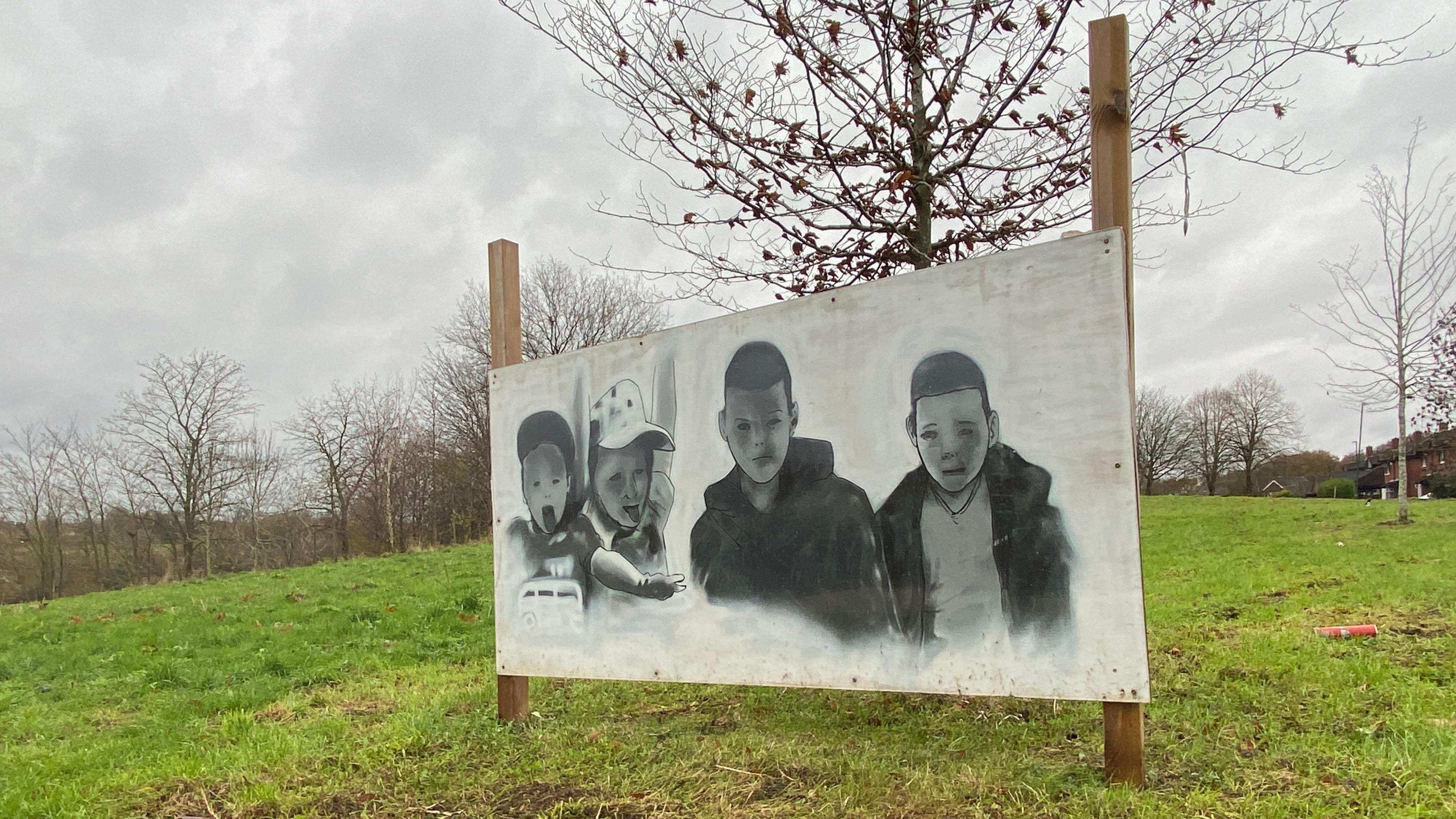 A spray painted image of Jack Johnson, brothers Finlay and Samuel Butler and their cousin Thomas Stewart