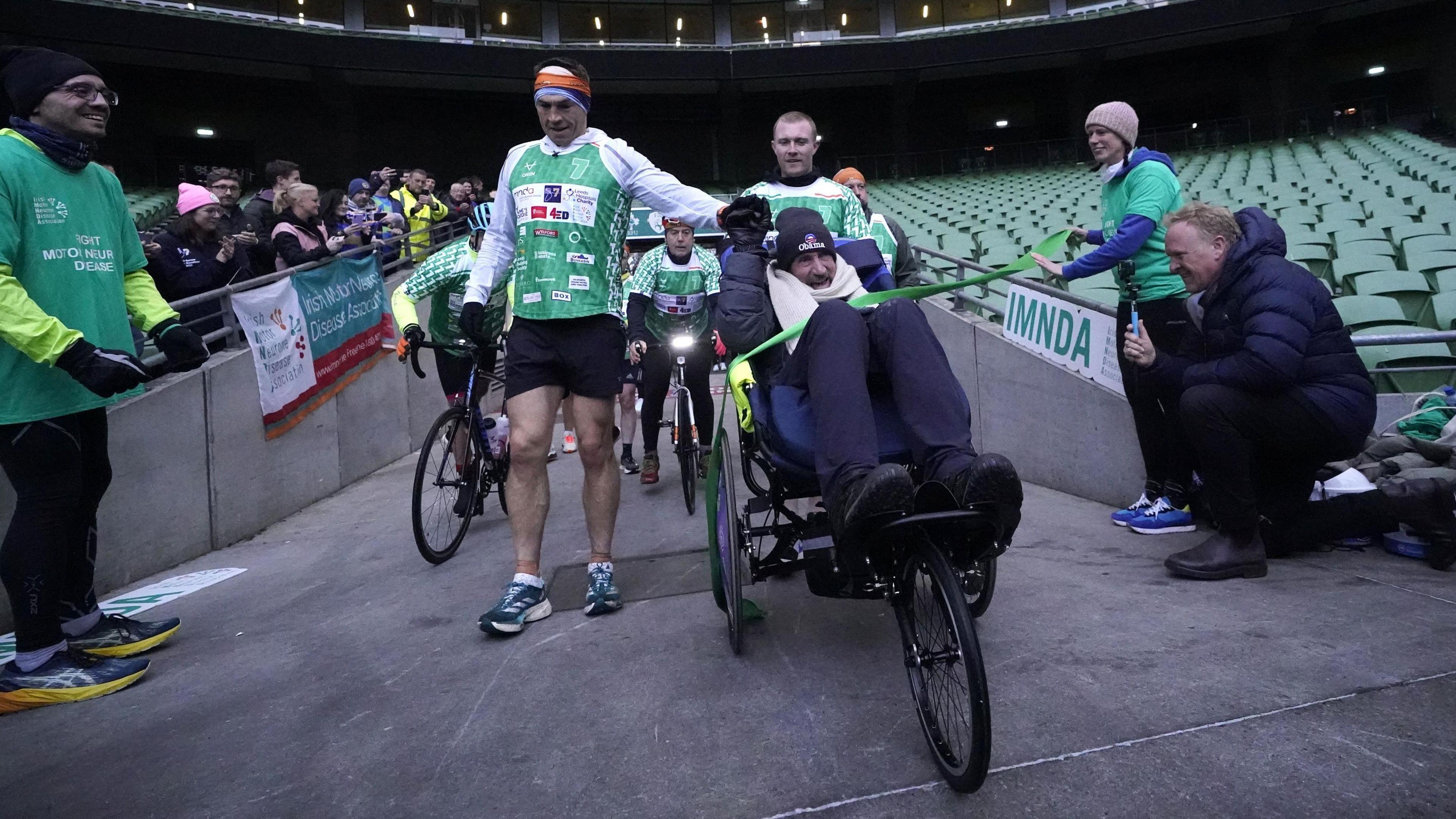 Kevin Sinfield (l) and Charlie Bird complete day five of 7 in '7 in 7 Challenge' in Dublin, December 2023