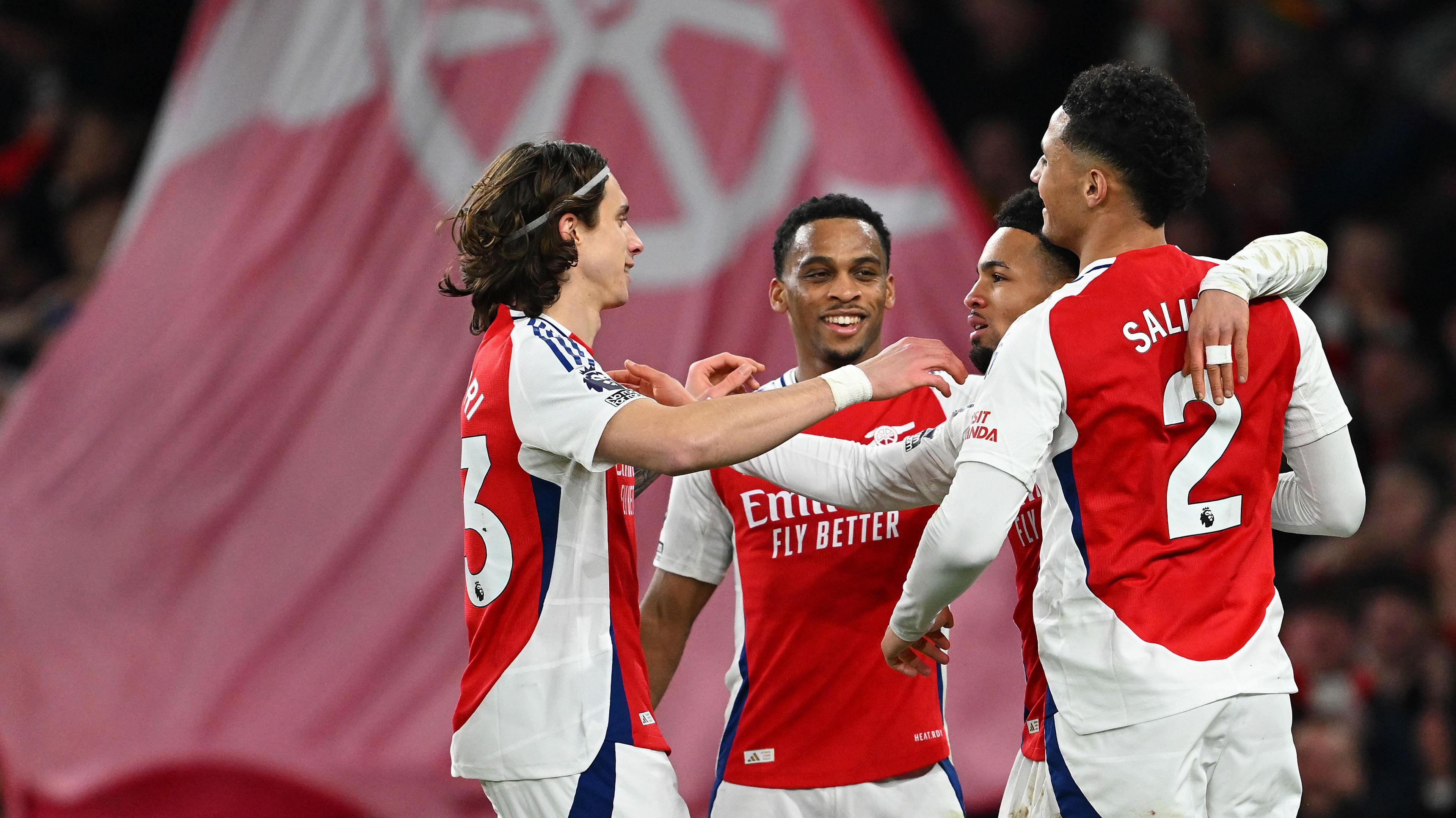 Arsenal's defenders celebrate together