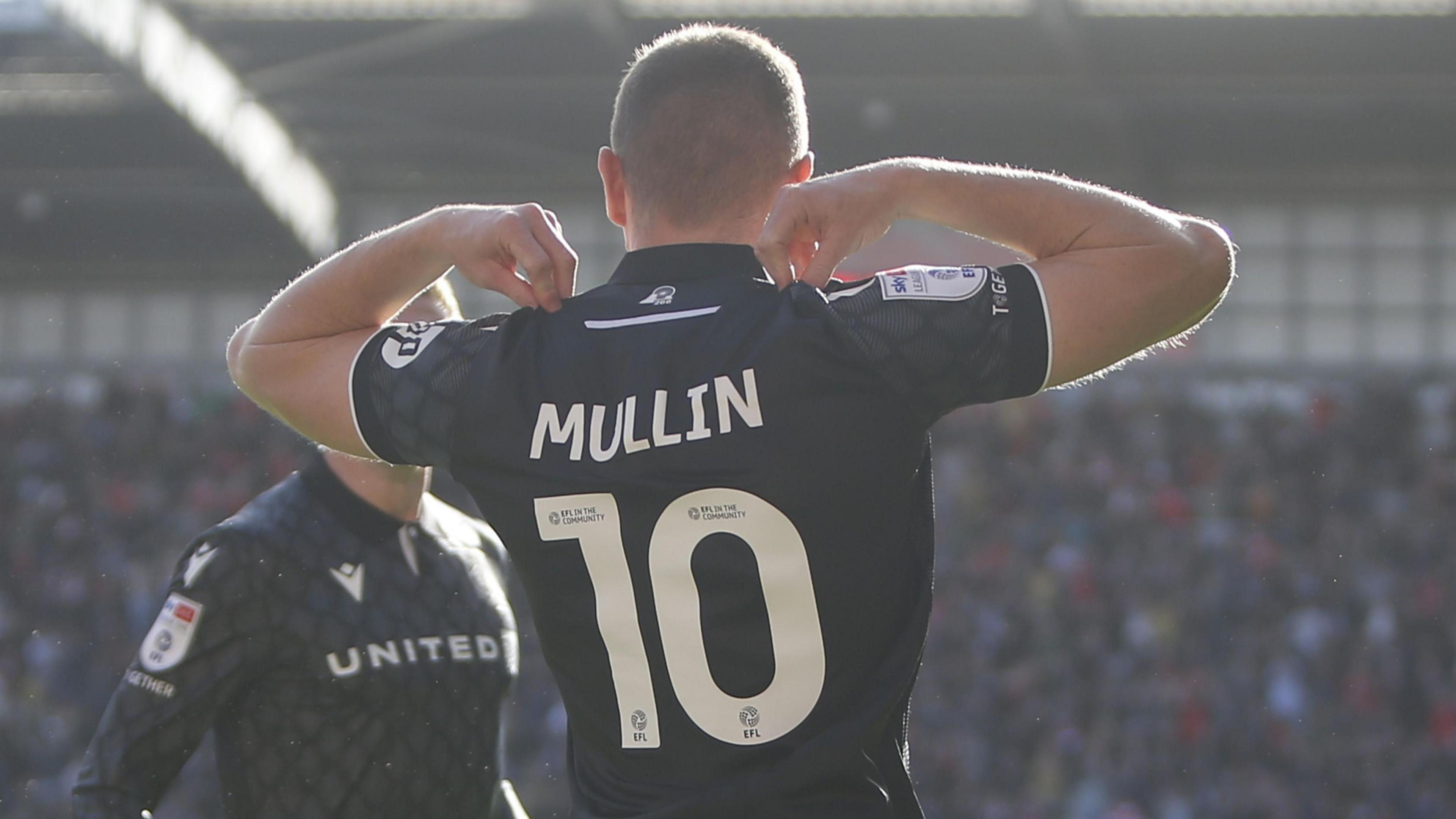 Paul Mullin celebrates a goal