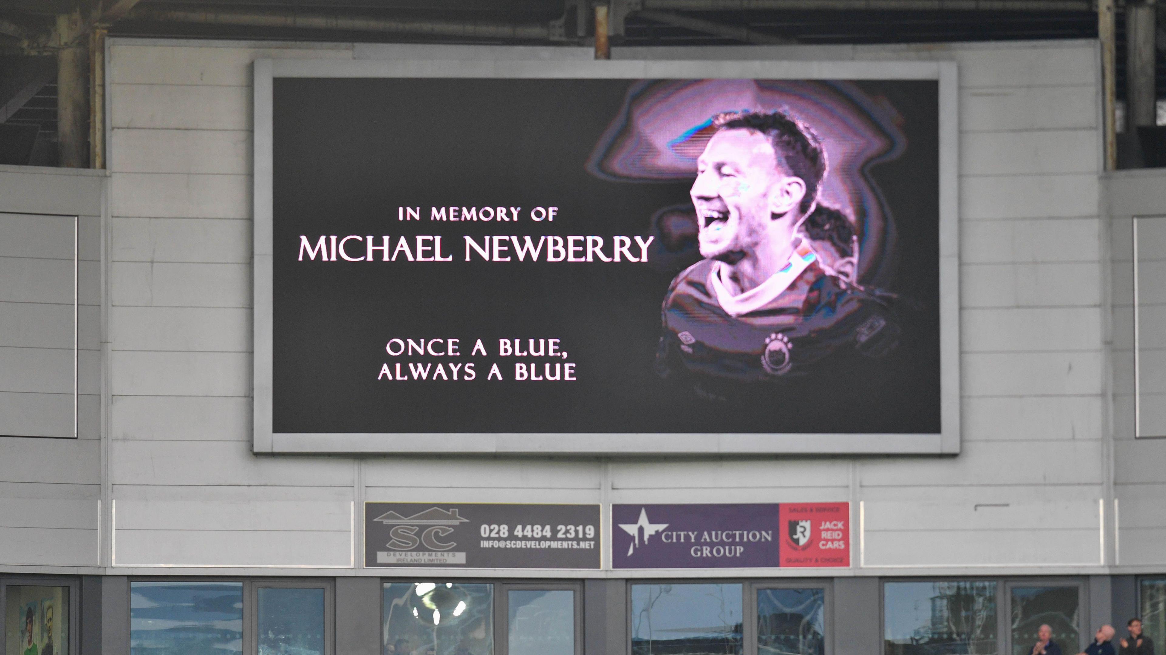 Tributes to Michael Newberry on the big screen at Windsor Park