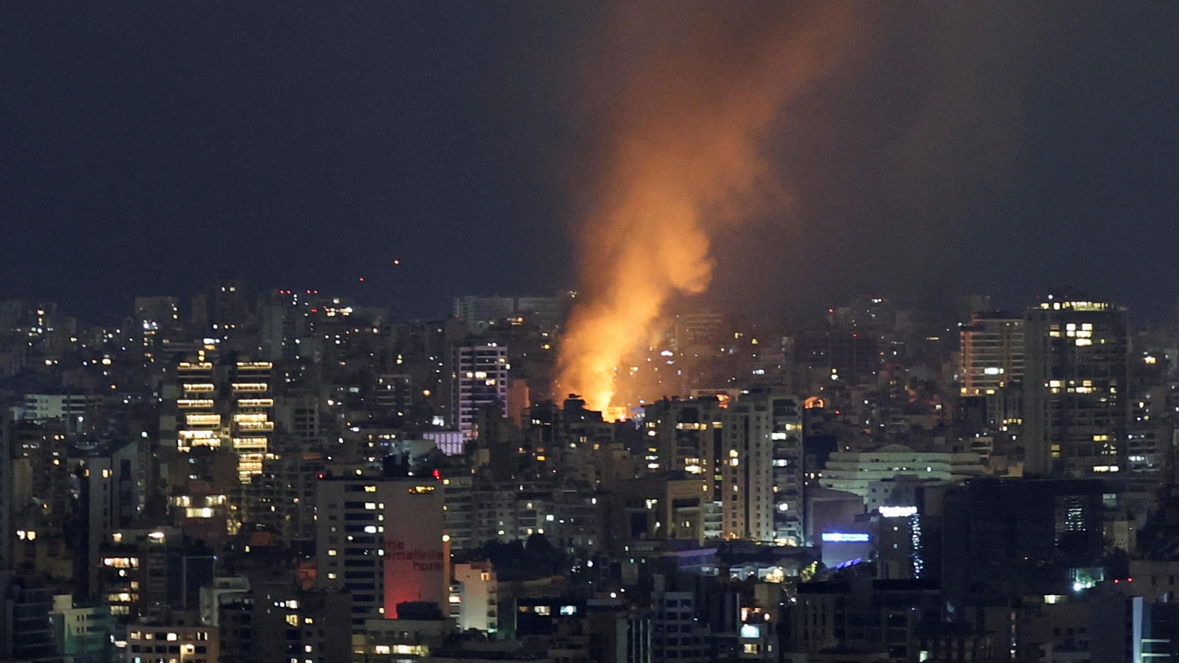 Smoke and fire rise over Beirut, after Israeli air strikes, amid ongoing hostilities between Hezbollah and Israeli forces