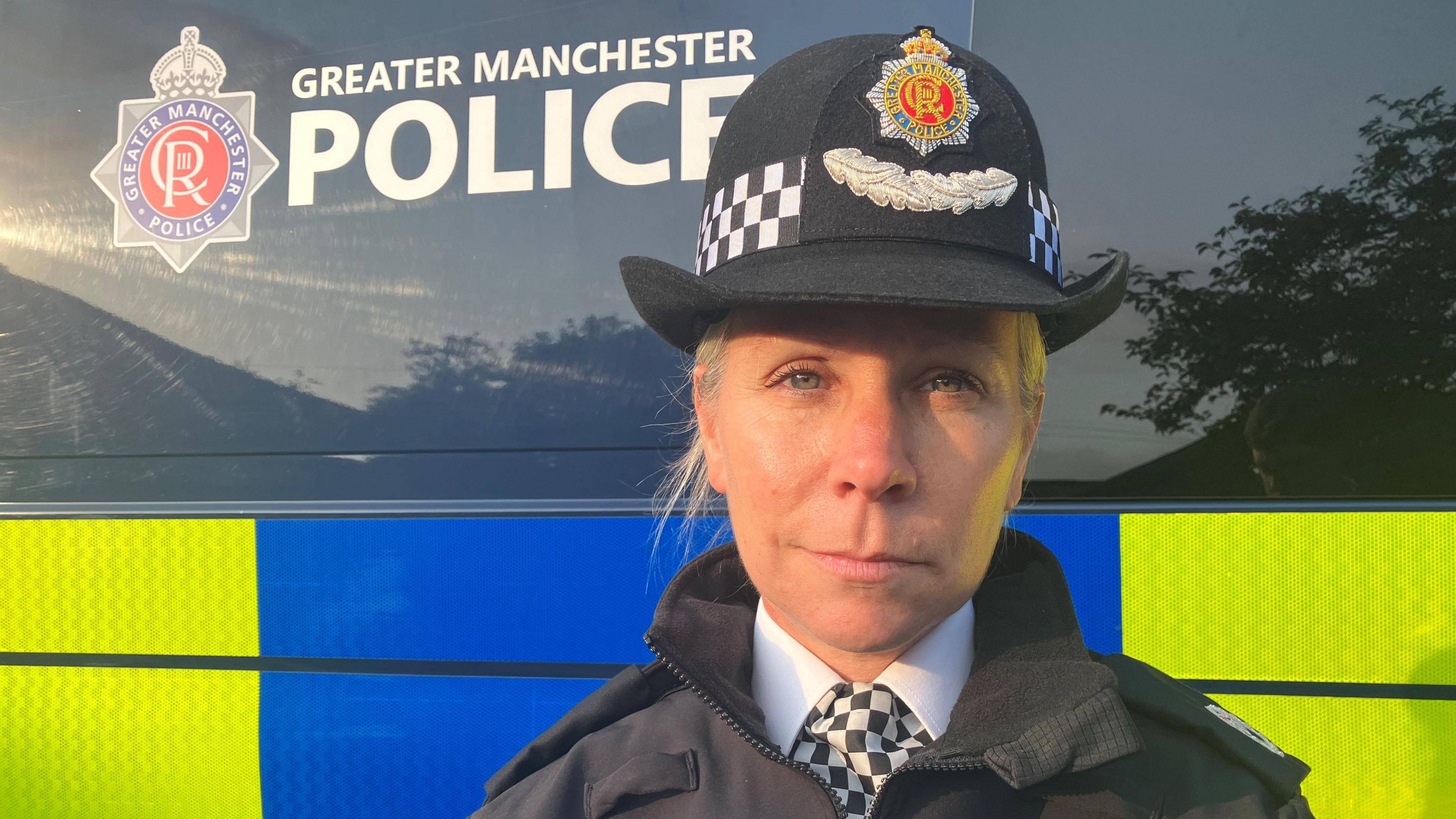 Assistant Chief Constable Steph Parker stands outside a police van