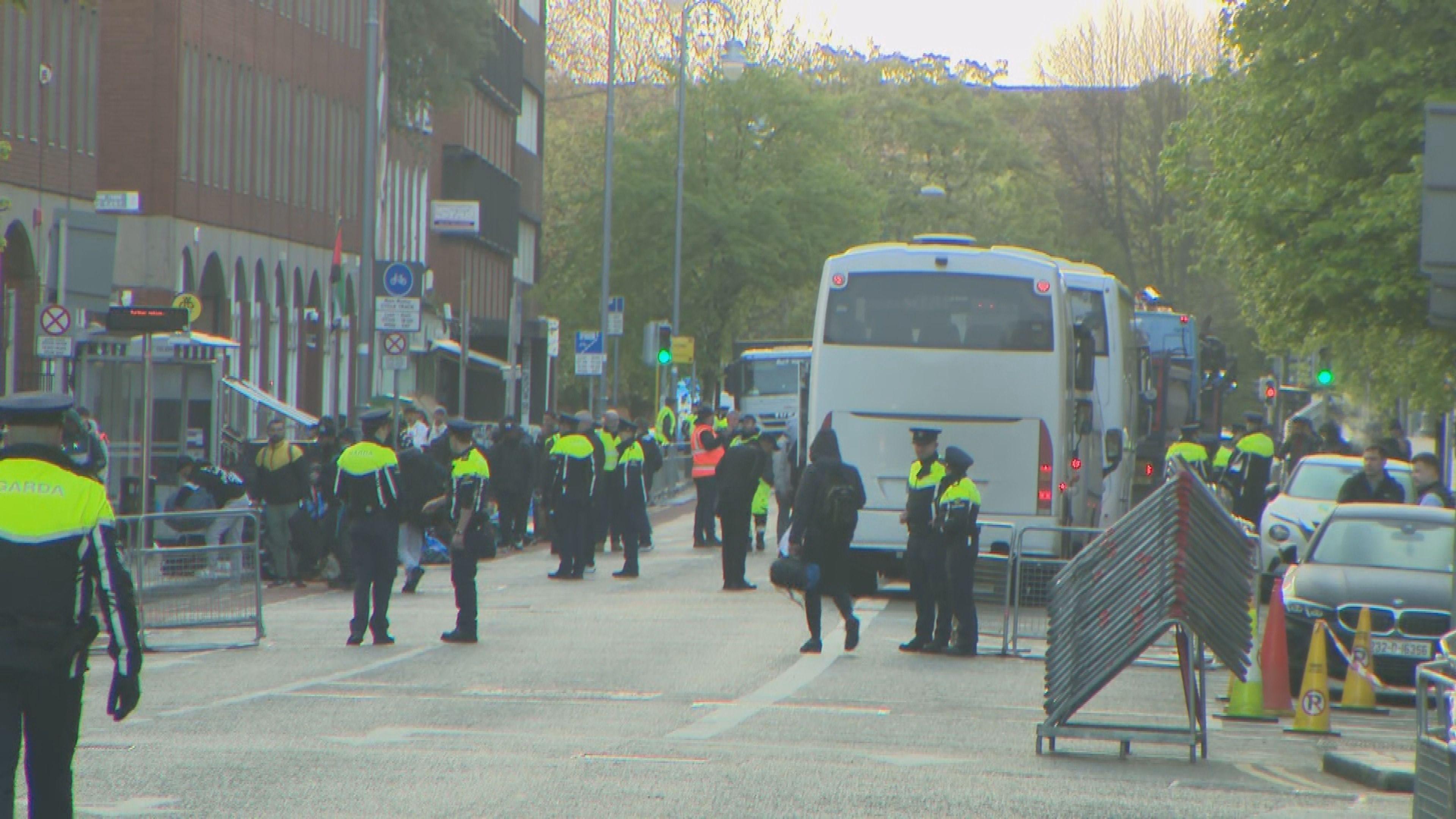 Asylum seekers and buses on Mount Street