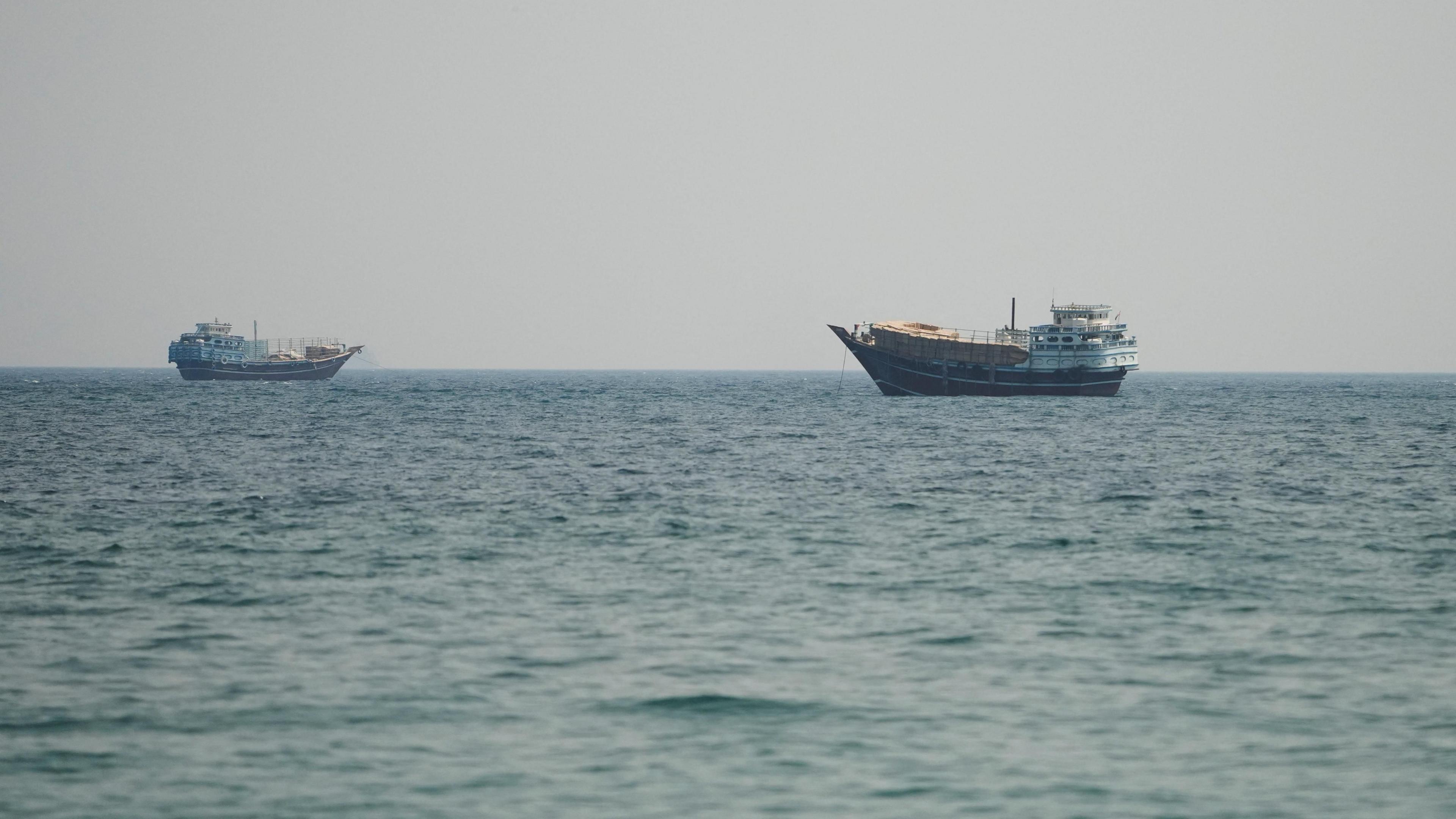 Two vessels in the Strait of Hormuz, as seen from Musandam, Oman. 
