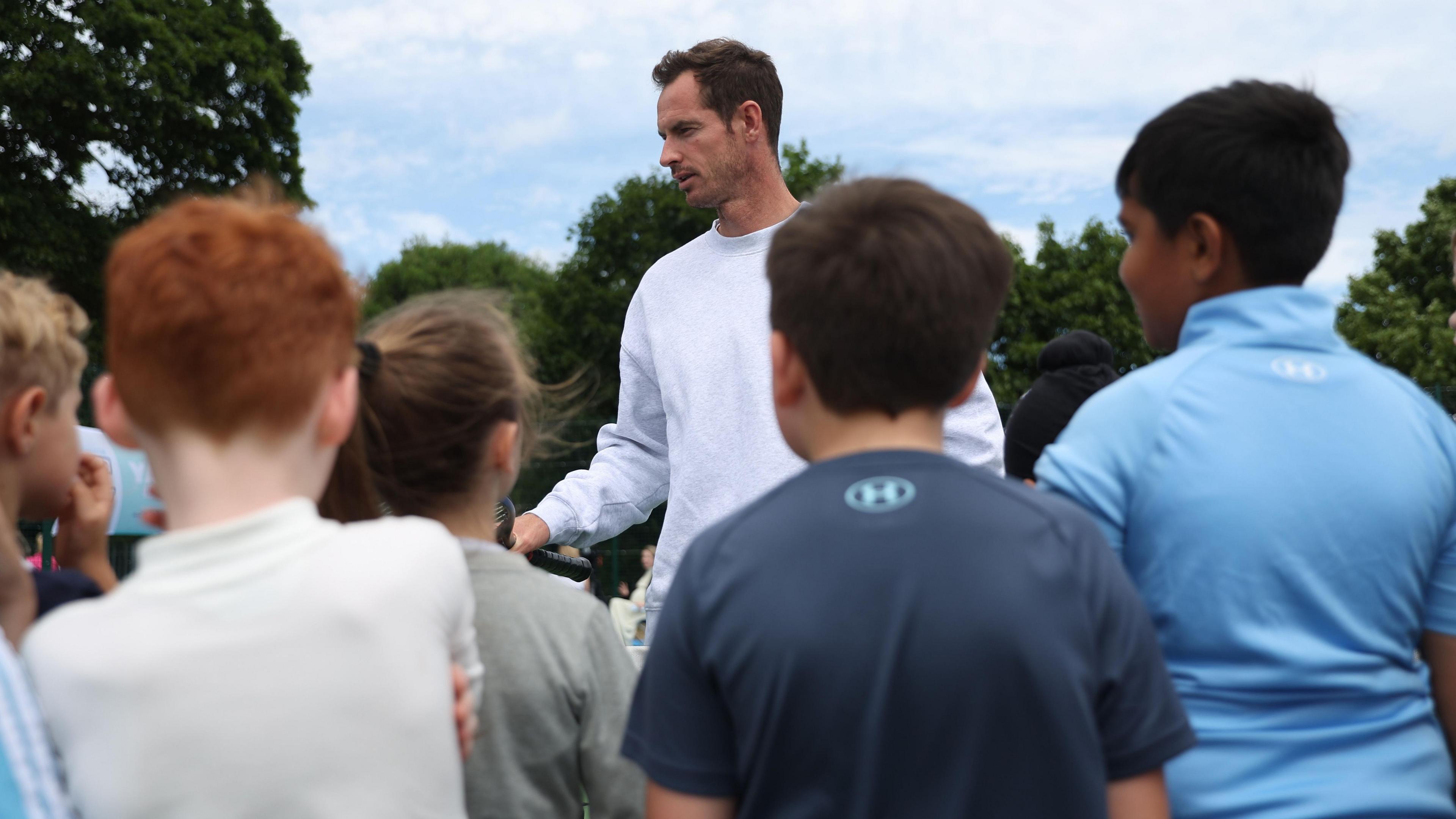 Sir Andy Murray speaking to schoolchildren at the LTA's Park Tennis Project.