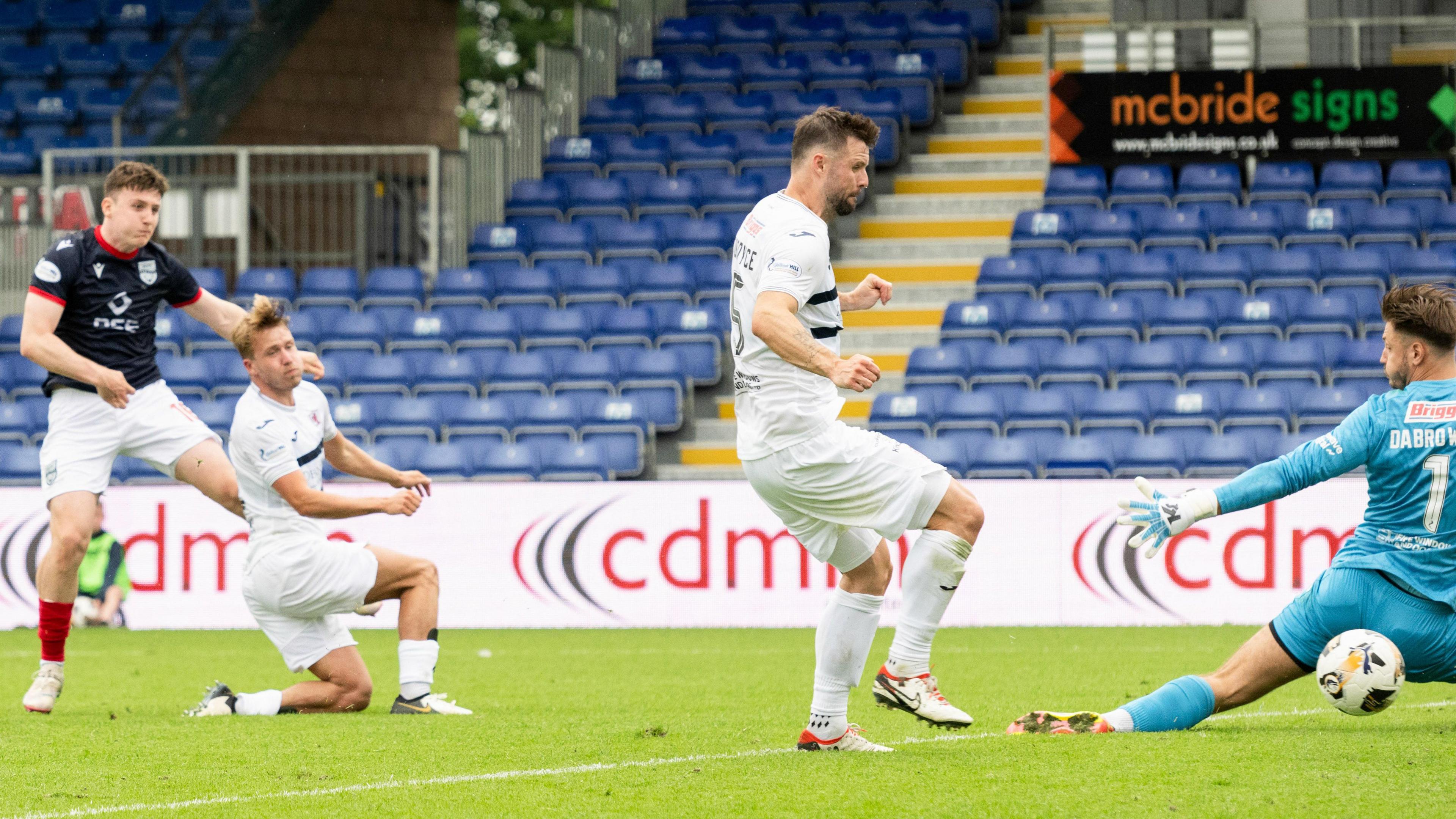 George Harmon scores for Ross County against Raith Rovers