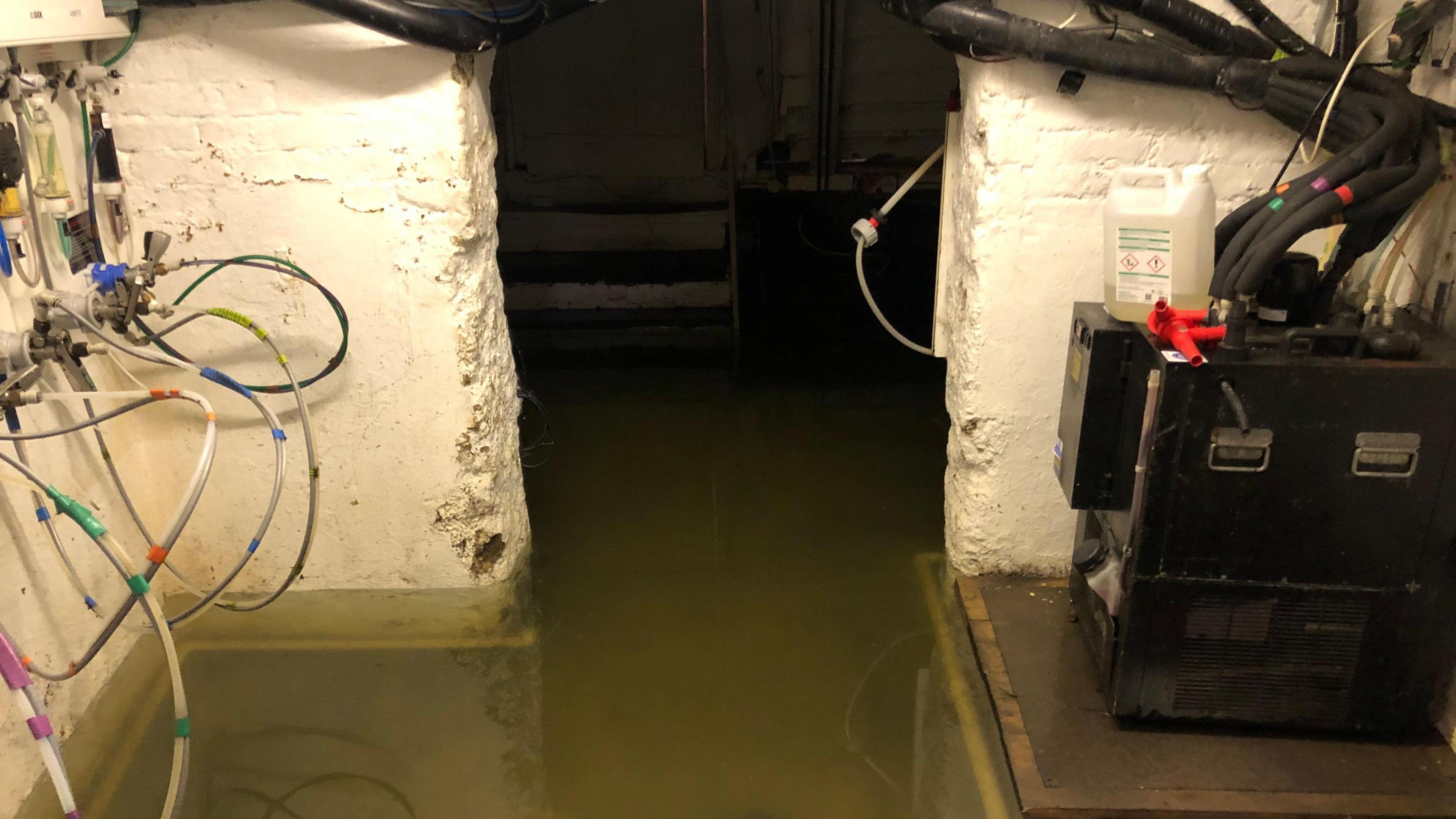 Flood water in the cellar of the pub