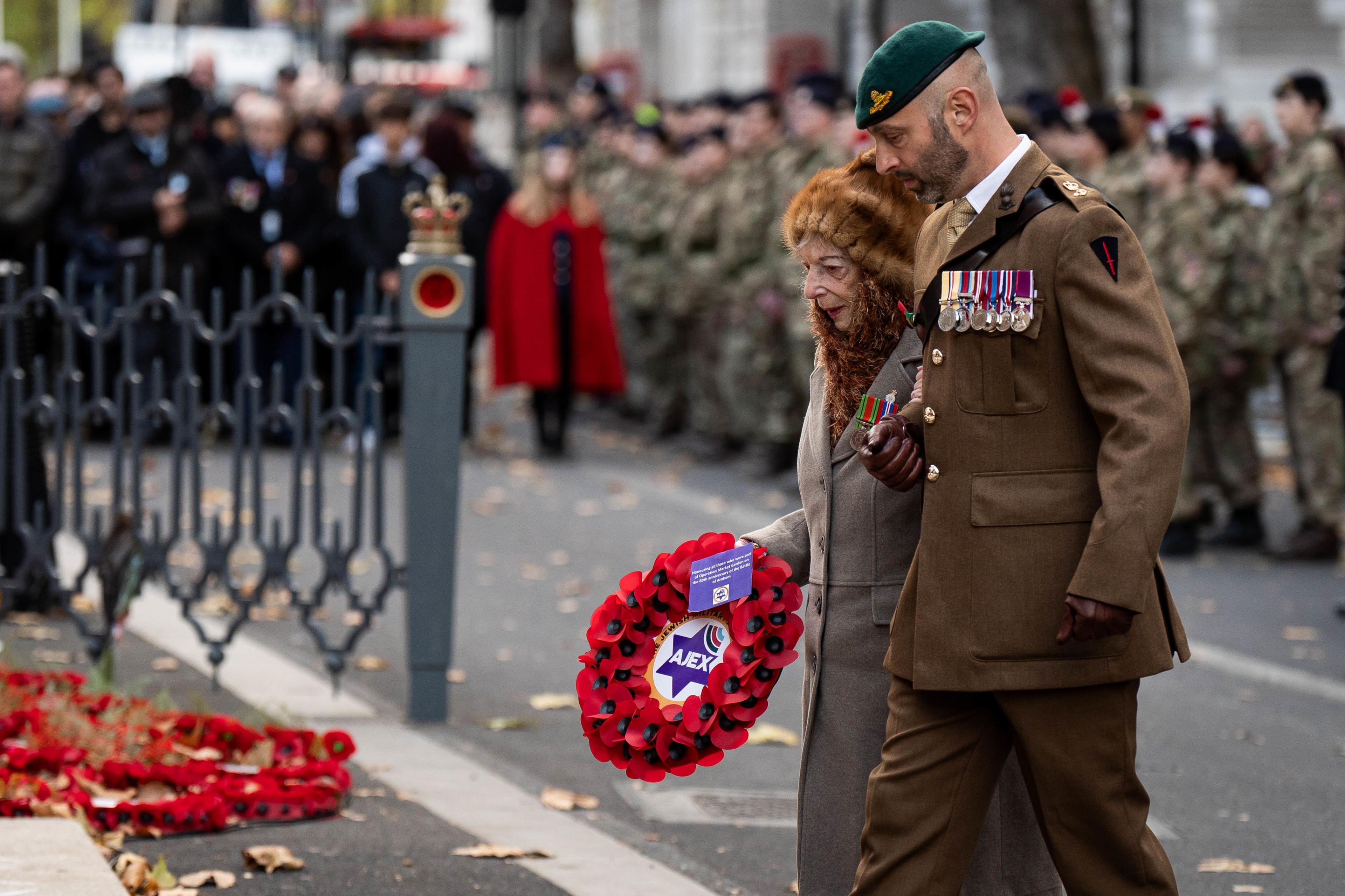 Henny Franks, 101, (left) Kindertransport survivor lays a wreath during the annual parade by AJEX, the Jewish Military Association, 