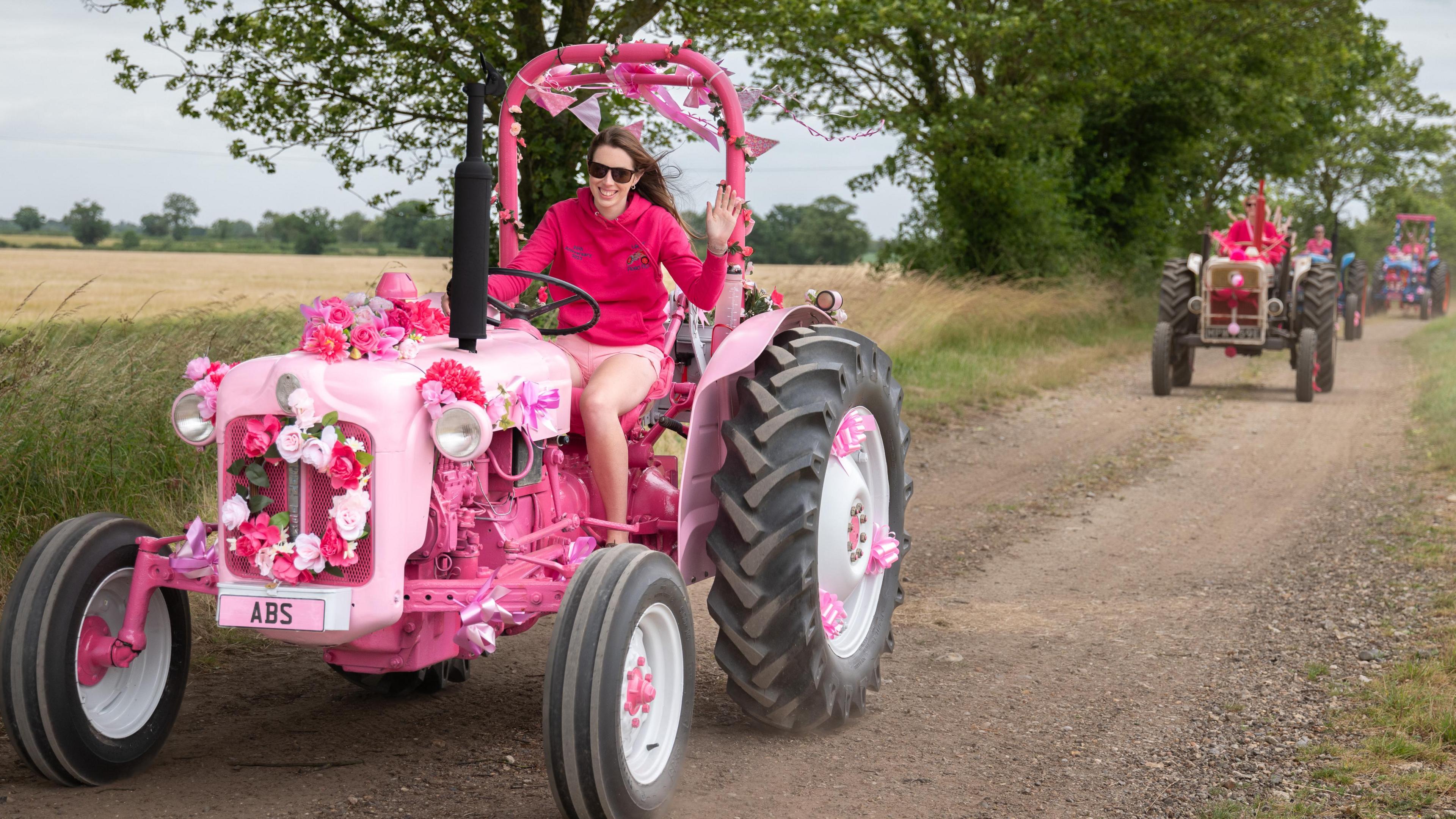 Pink Lady on tractor