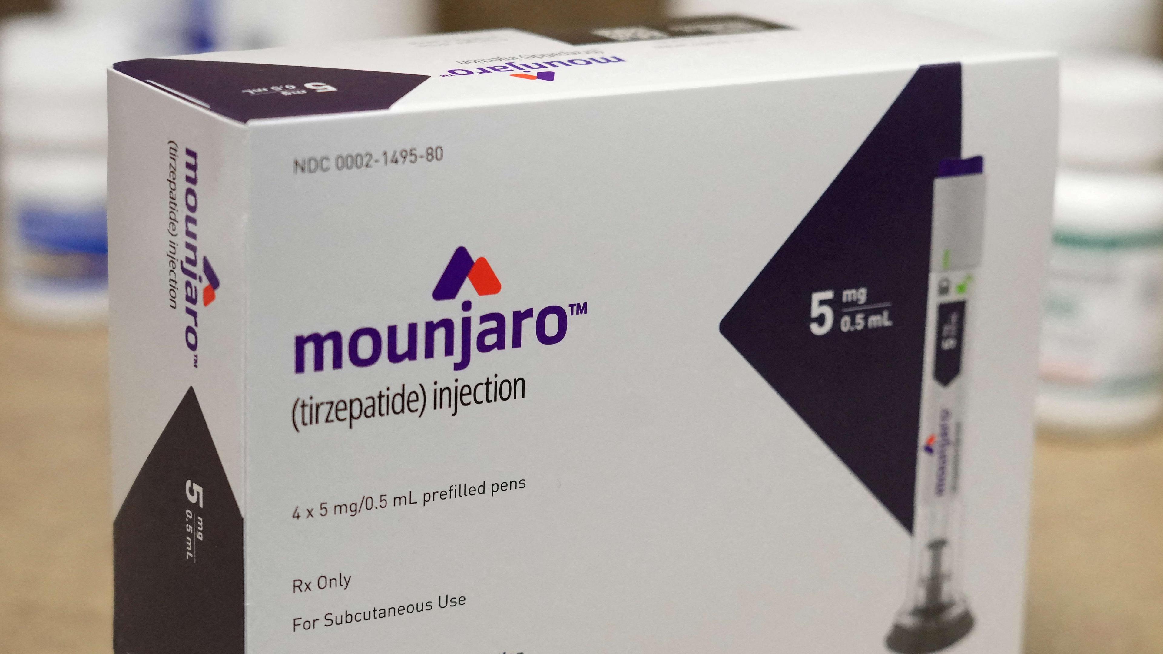 A box of four pre-filled pens containing Mounjaro