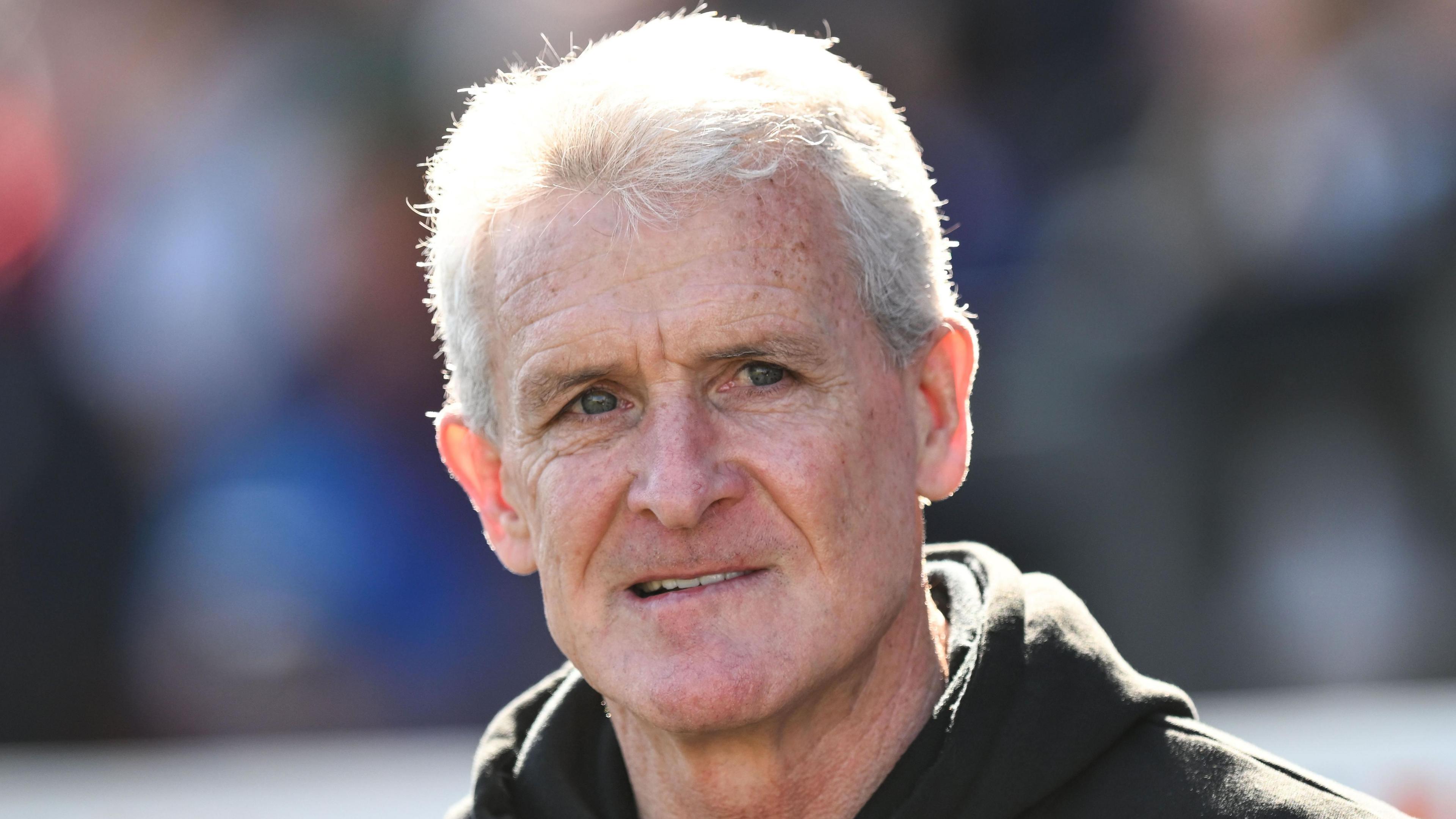 Mark Hughes looks on during Carlisle United's League Two fixture against Newport County