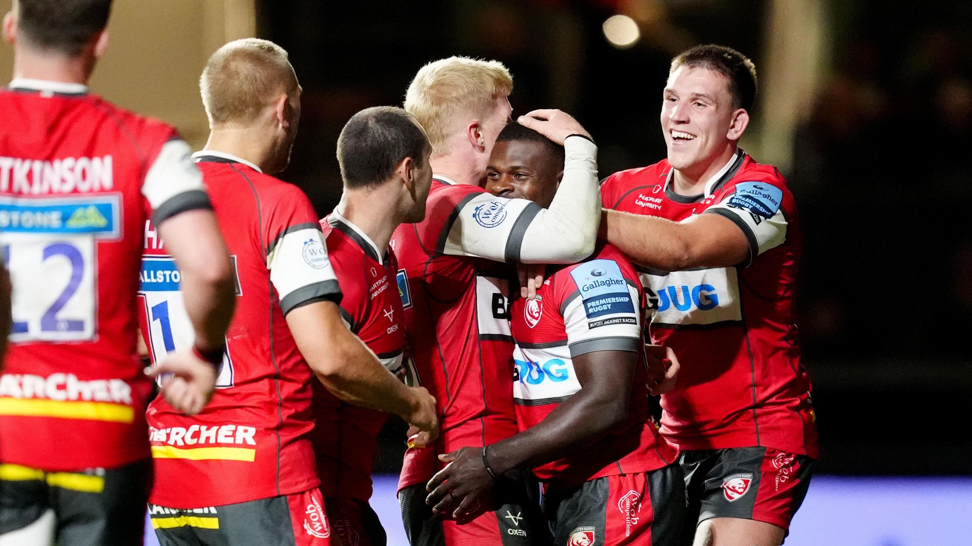 Gloucester's Christian Wade is congratulated by his teammates after scoring a try during the Gallagher Premiership match at Ashton Gate, Bristol.