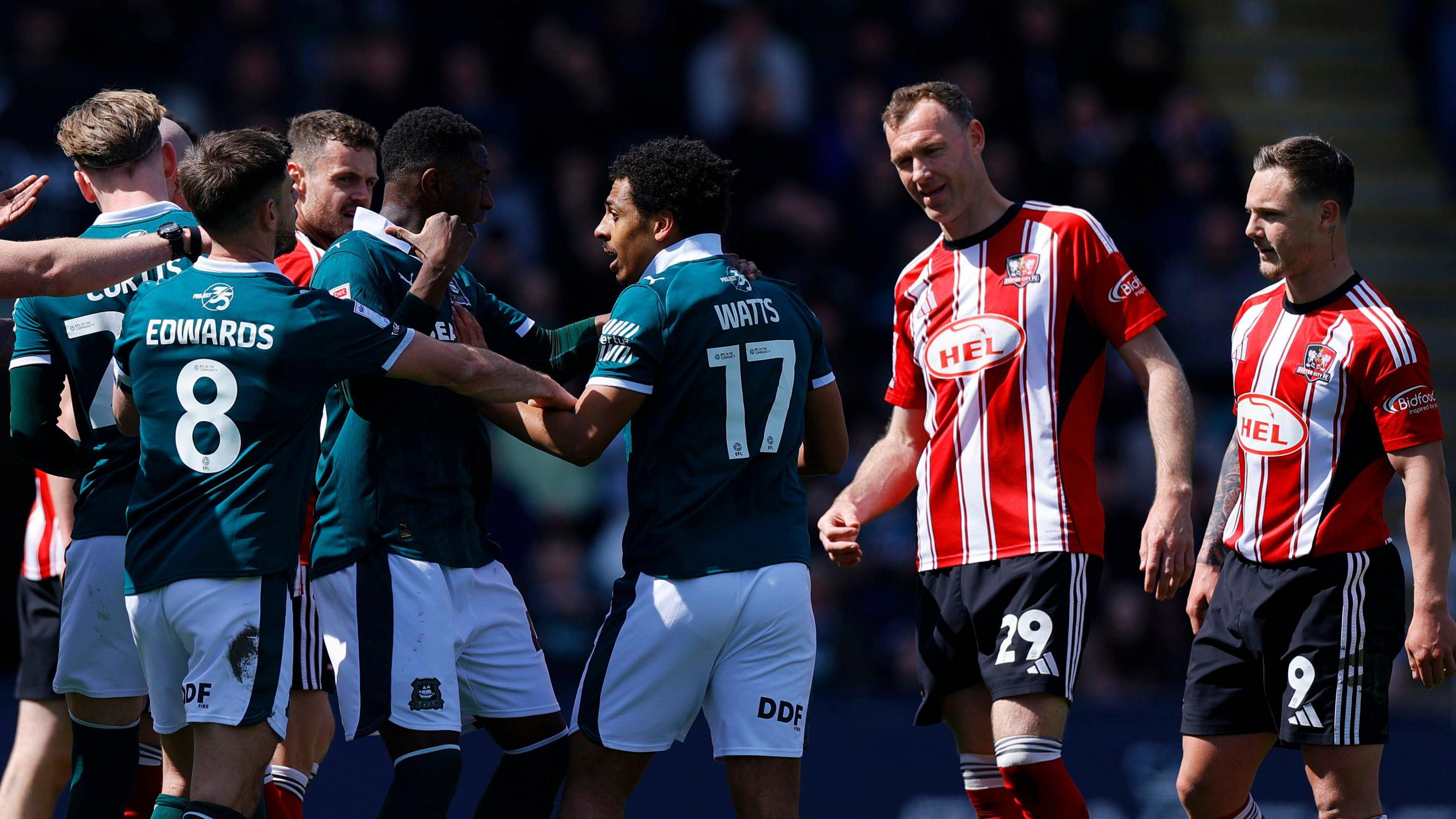 A scuffle between Plymouth Argyle and Exeter City players during April's derby at Home Park