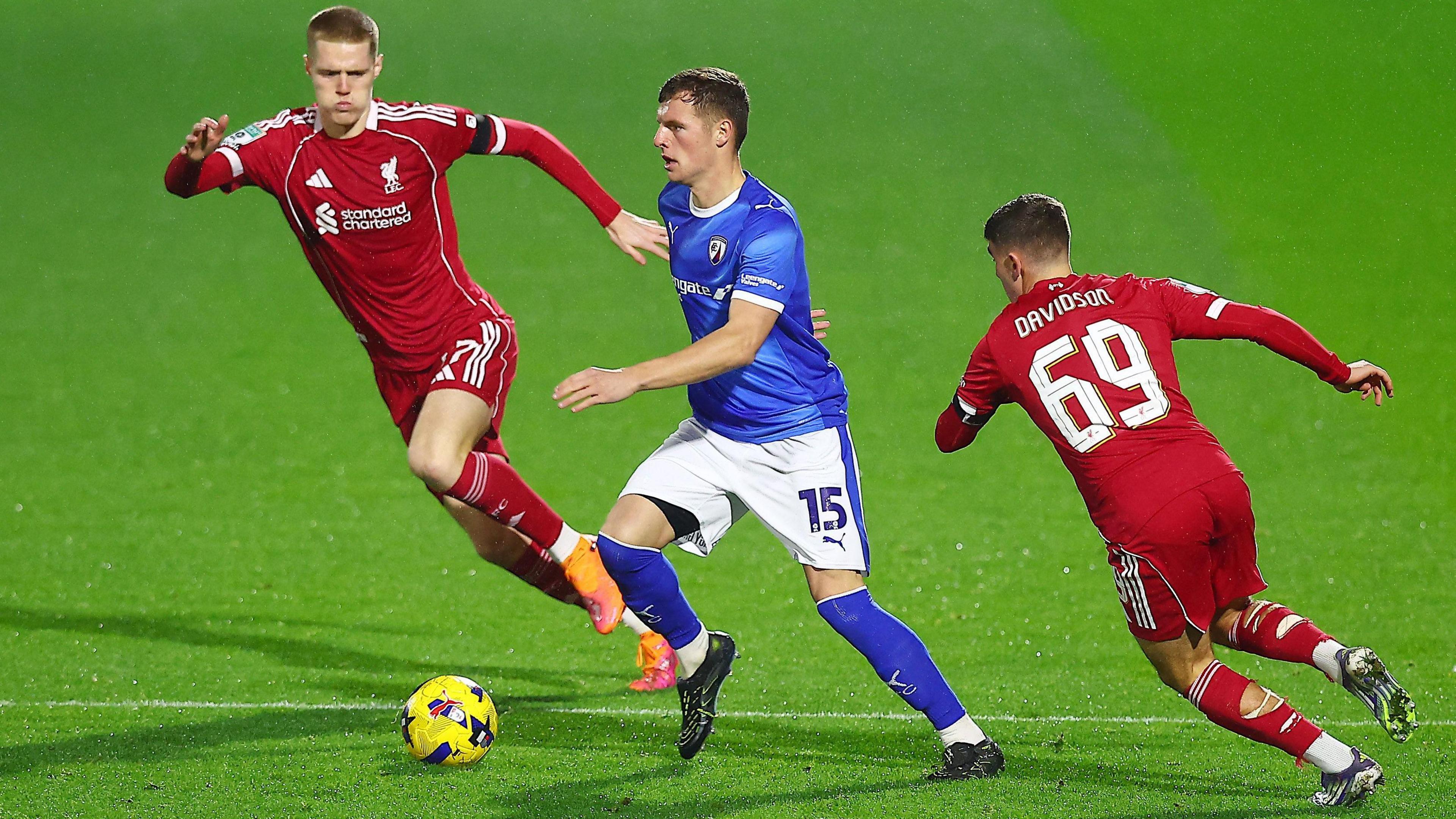 Chesterfield's Bailey Hobson runs with the ball against Liverpool
