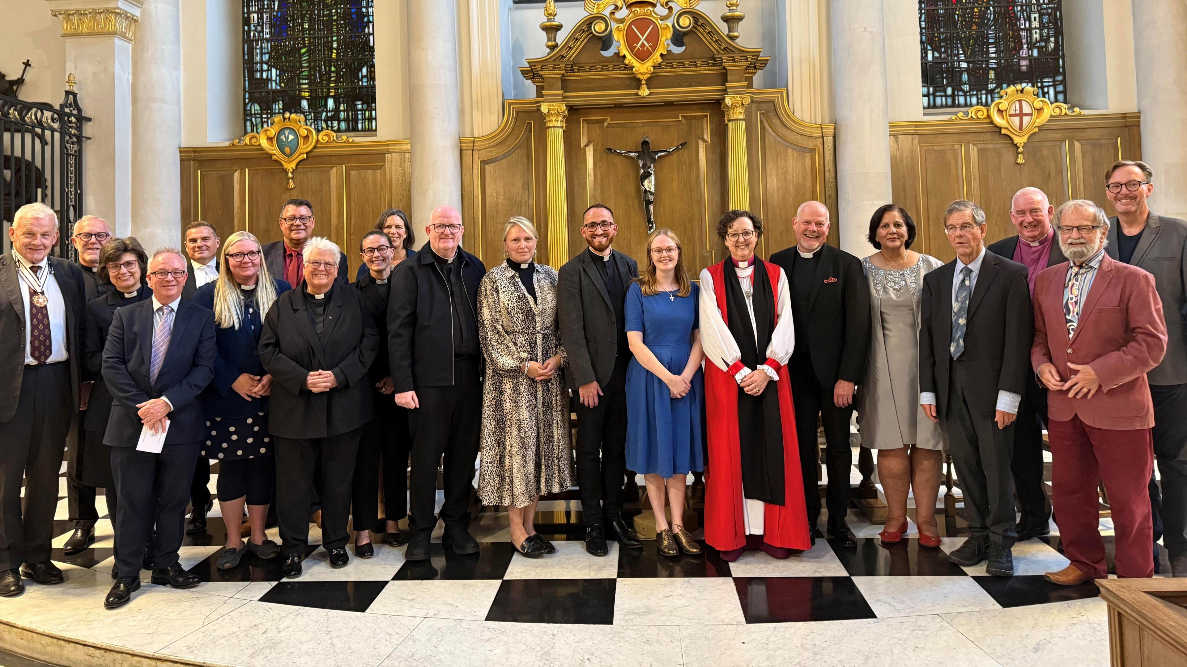 Bishop Joanne Grenfell pictured after the service at Saint Mary-le-Bow in Cheapside with well-wishers from Suffolk.