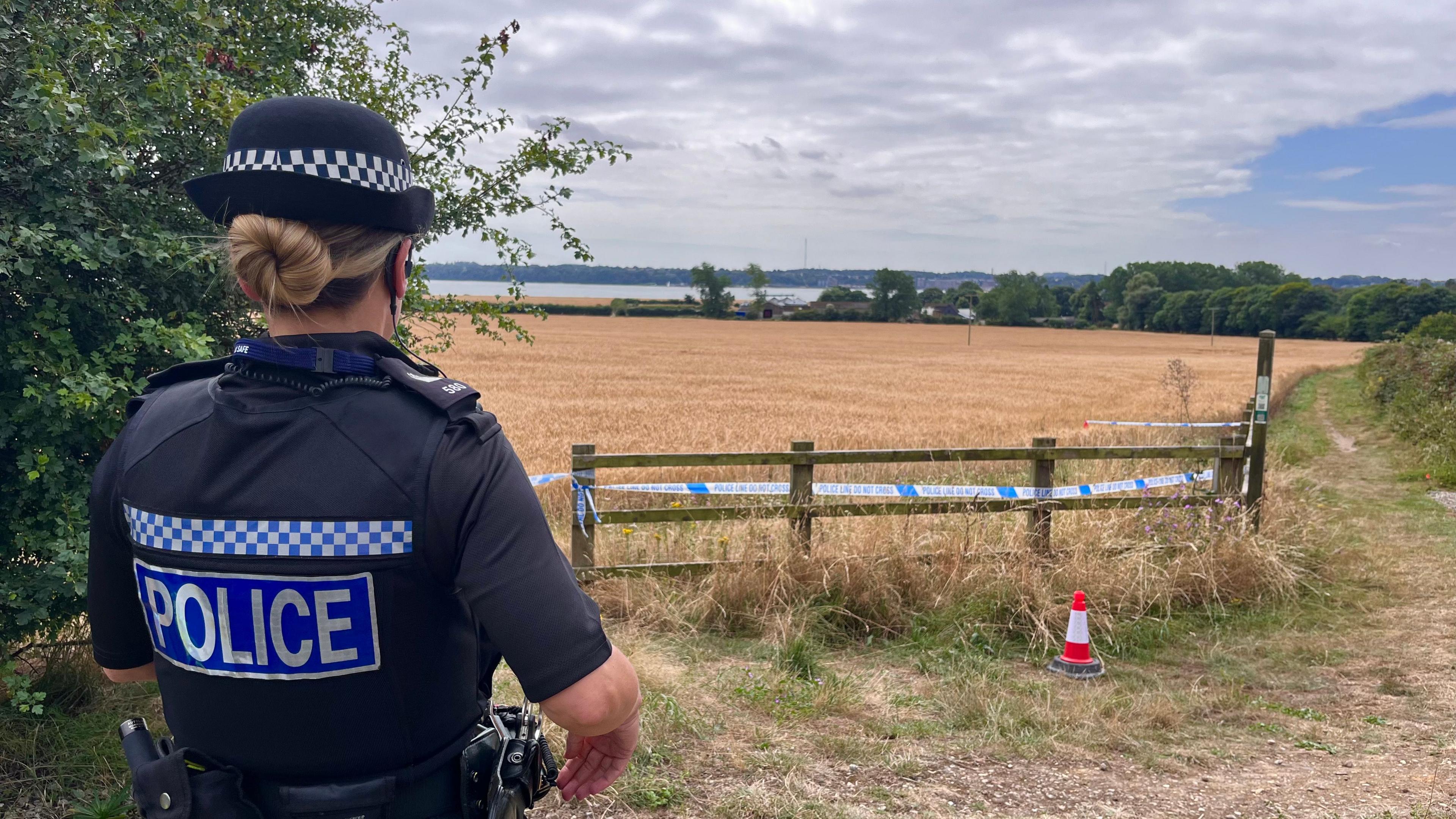 An officer standing by a police cordon in Brantham following Anita Rose's murder