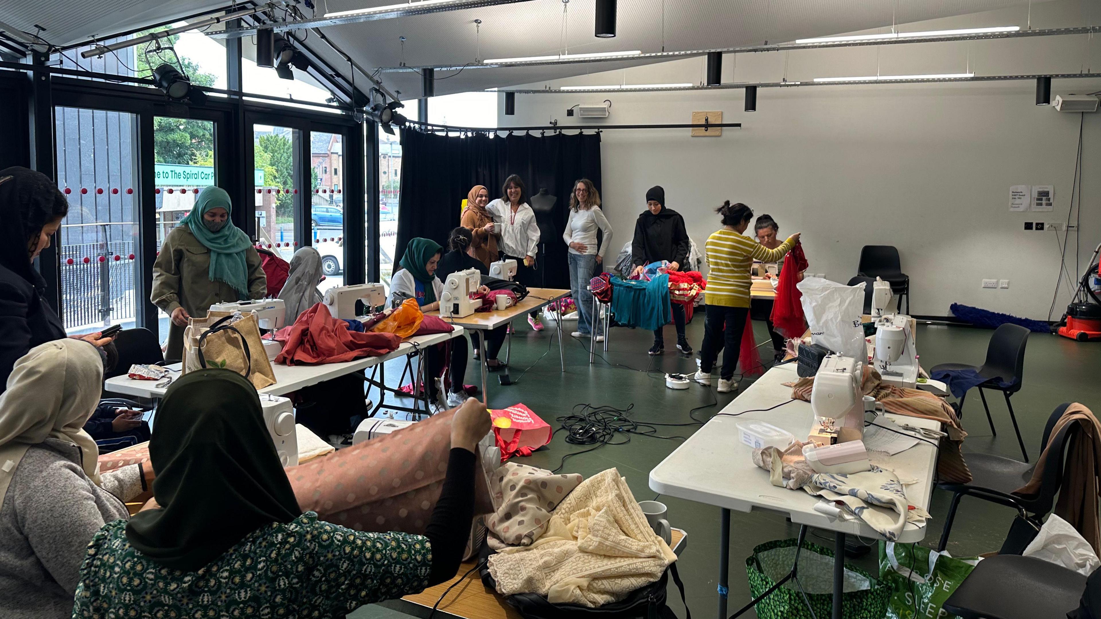 The sewing group in action one Friday in Ipswich