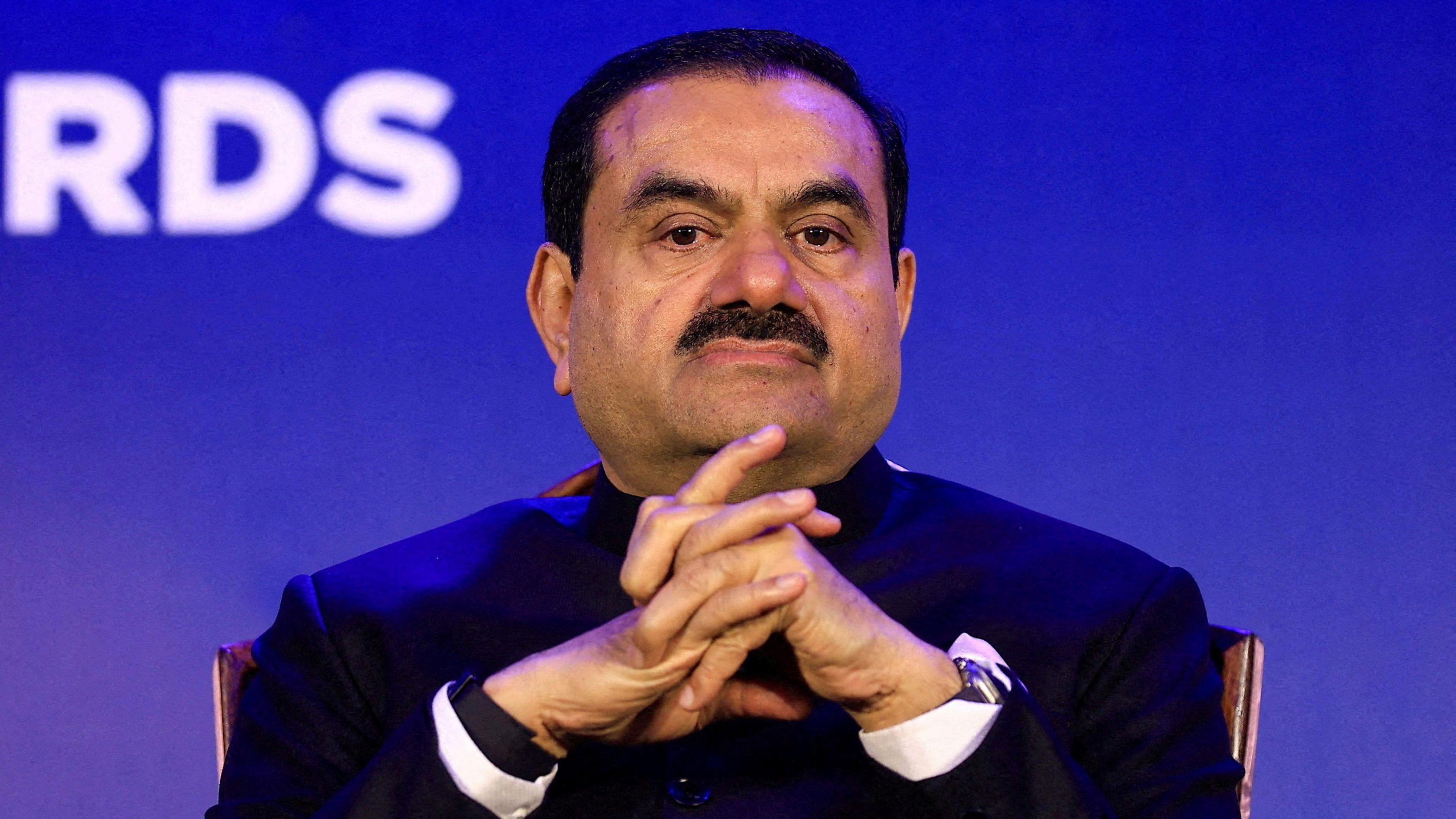  Indian billionaire Gautam Adani - wearing a black coat and a white shirt - attends the 51st Gems and Jewellery Awards in Jaipur, India, November 30, 2024. 