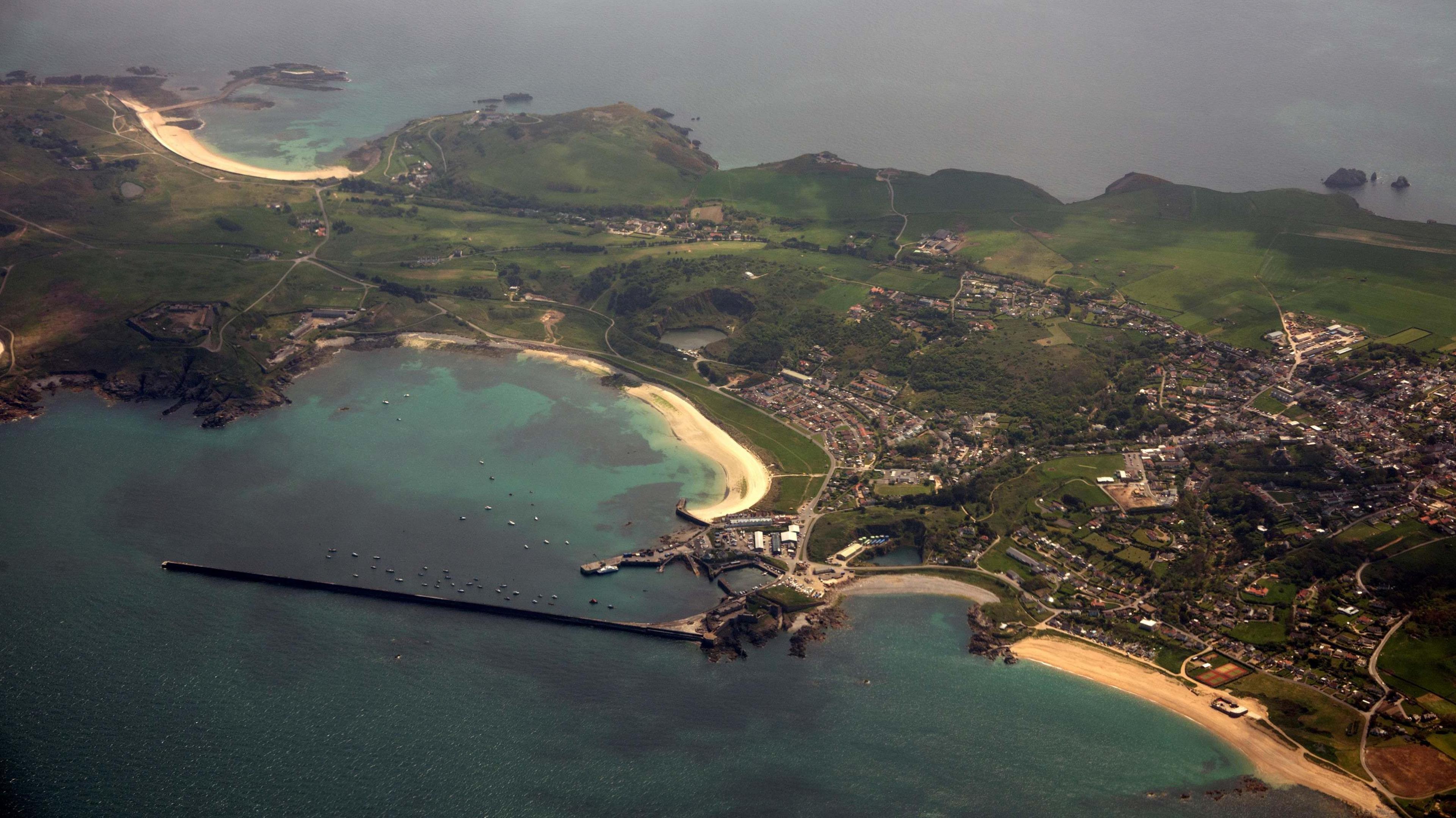 General aerial view of Alderney from plane flying above the island.