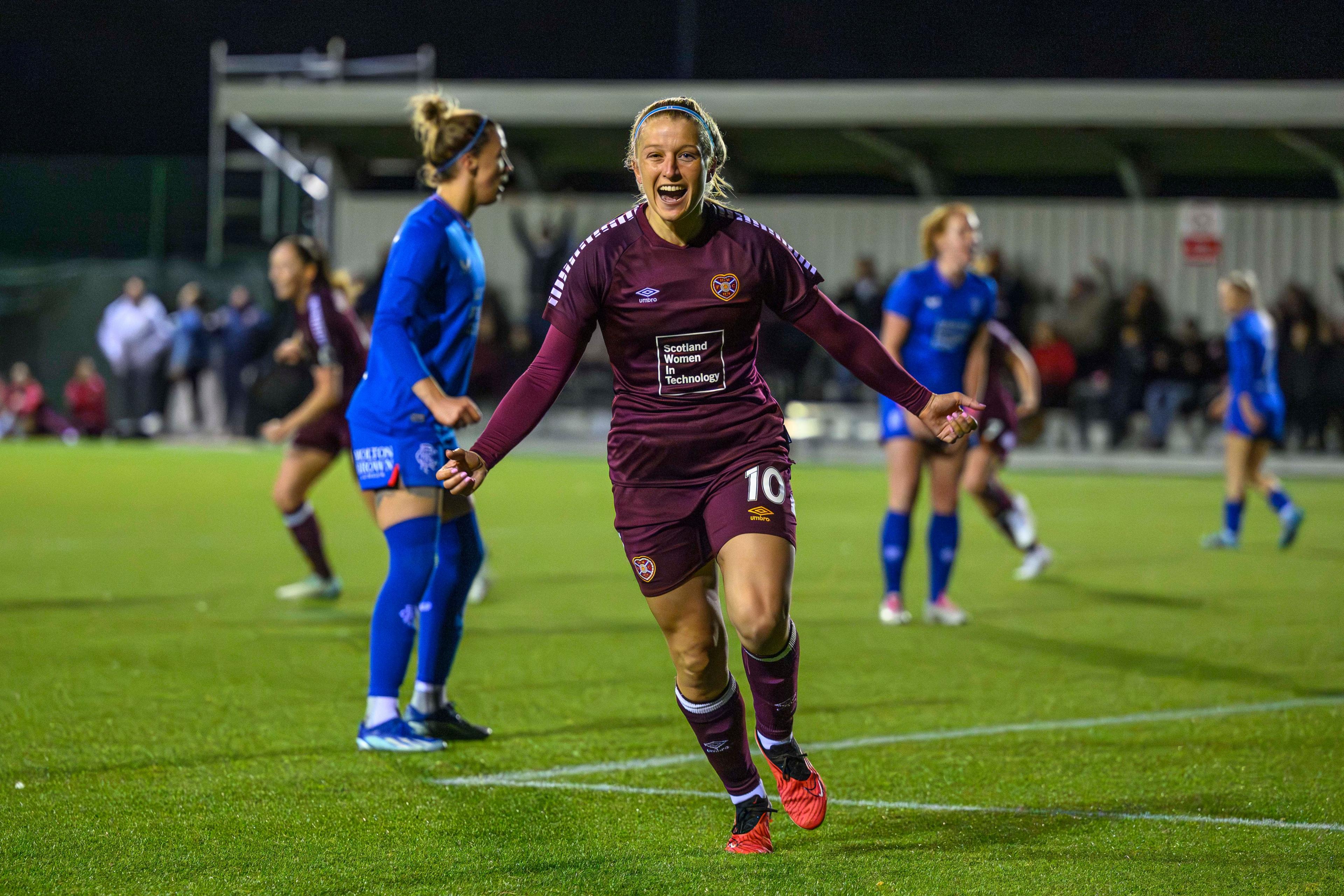 Katie Lockwood celebrating after scoring against Rangers